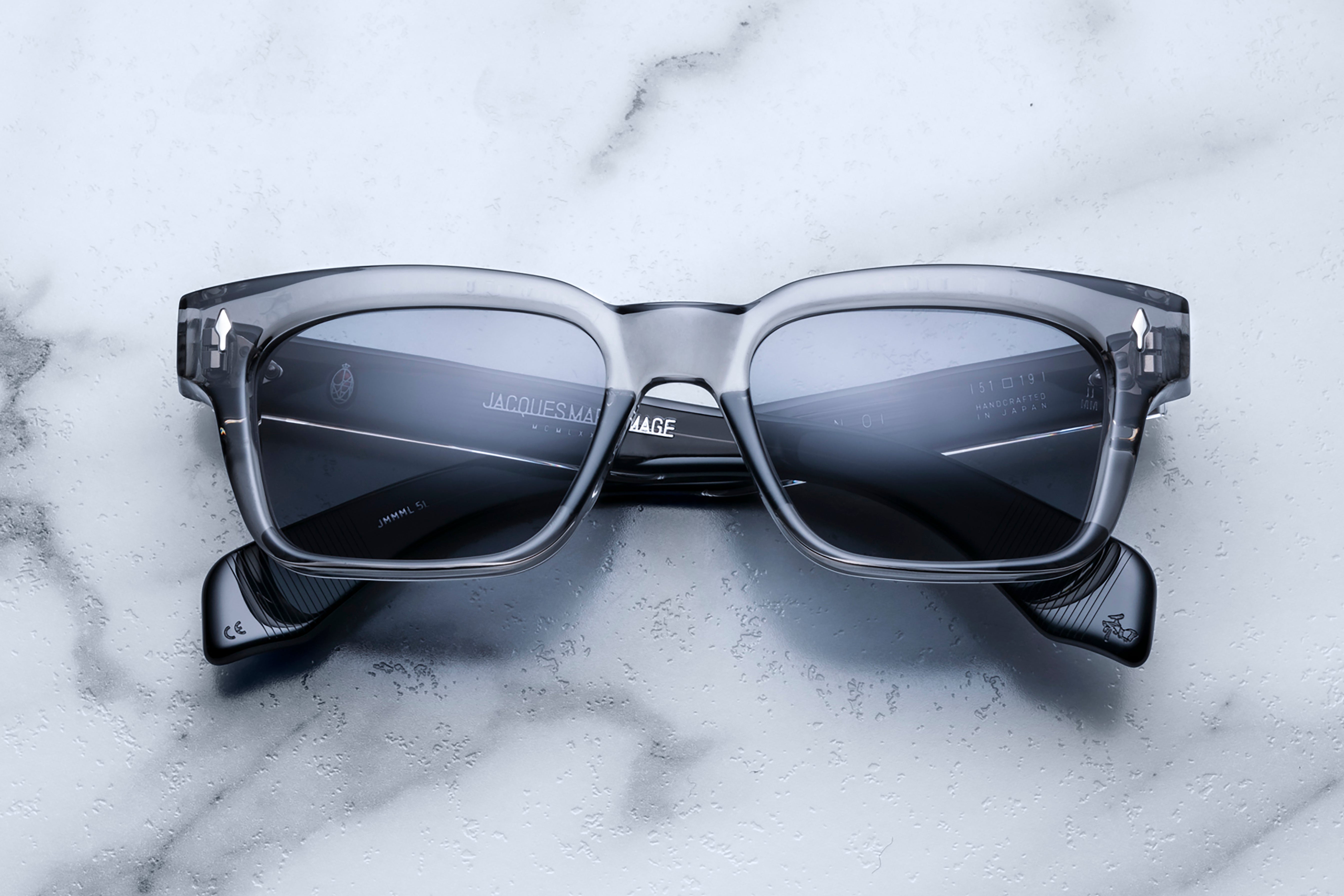 Jacques Marie Mage Molino platinum sunglasses with round frames and tinted lenses, front view showing sleek design and high-quality finish.