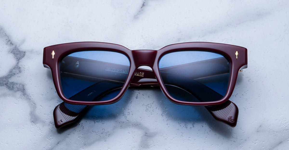 Jacques Marie Mage Molino Reserve sunglasses with black frames and dark tinted lenses, front view showing stylish design.