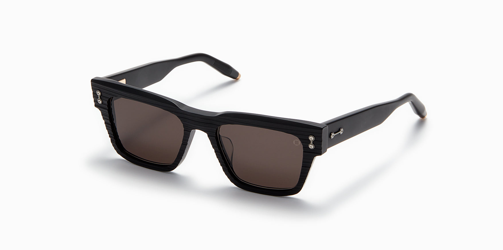 Akoni Columba bicycle saddle with sleek black design and ergonomic shape for comfortable riding.