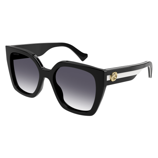 Gucci GG1300S sunglasses with black frames and dark lenses, displayed on a neutral background.