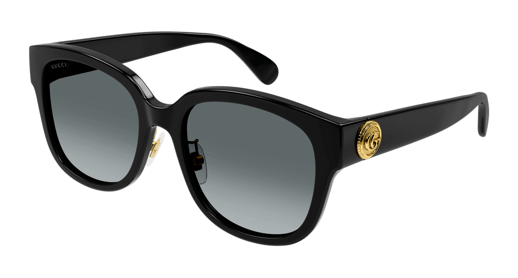 Gucci GG1409SK sunglasses with black frames and dark tinted lenses, stylish design for sun protection and fashion.