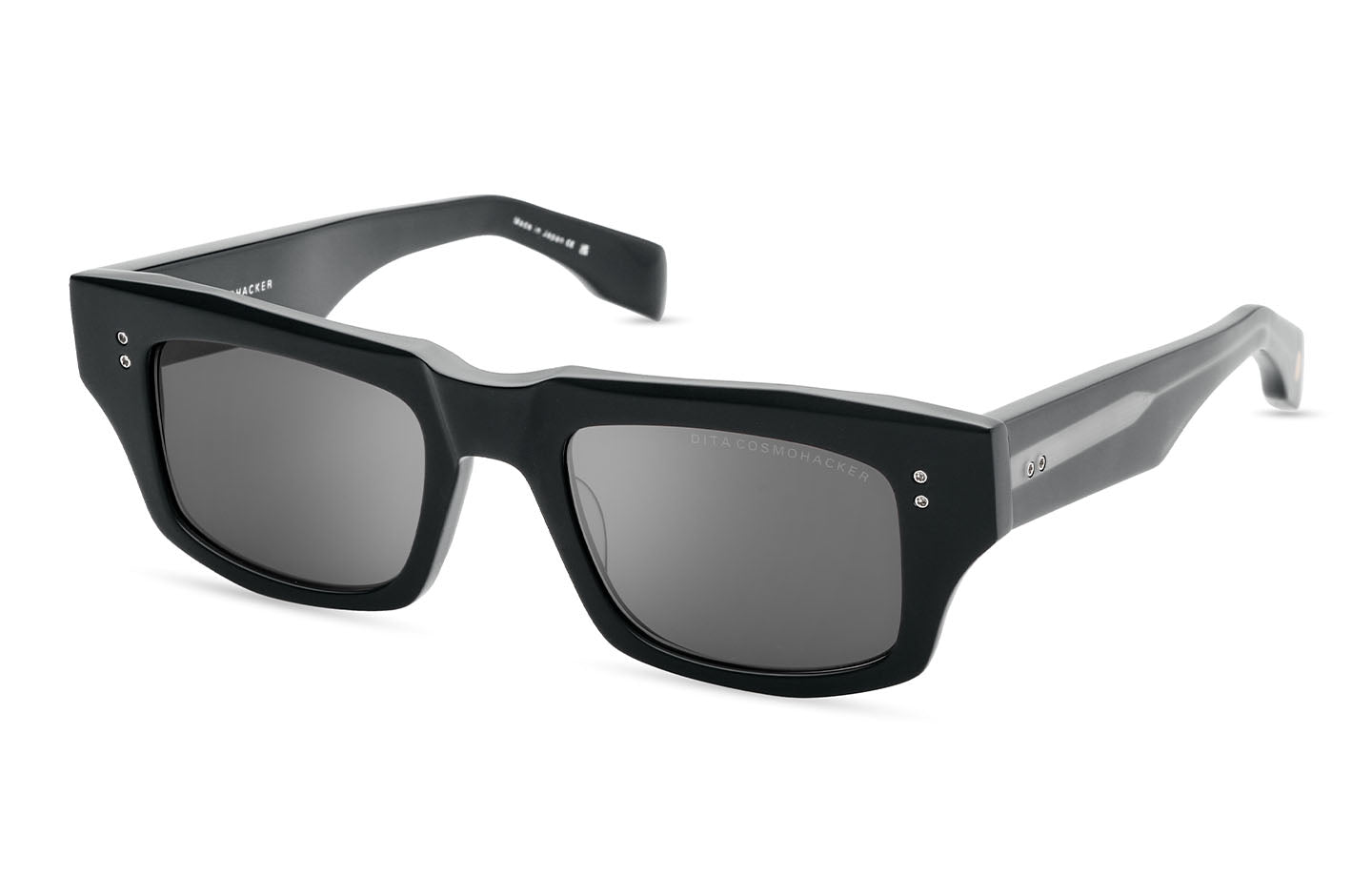 Close-up of DITA COSMOHACKER sunglasses showing sleek black frames and tinted lenses from an angled view.