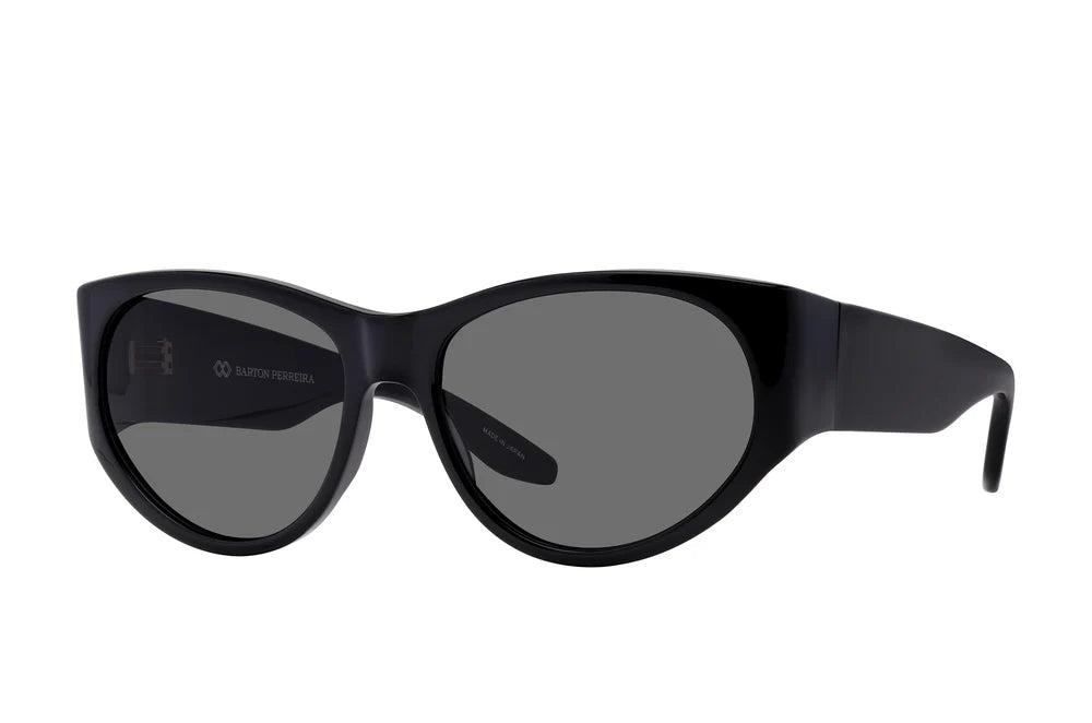 Barton Perreira CRUZ black noir sunglasses with sleek side detailing and modern design, shown from a side angle.