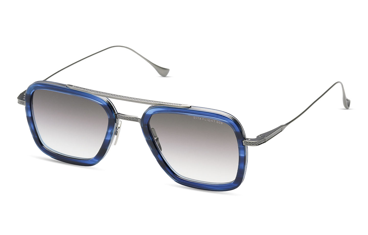 Dita Flight 006 sunglasses with blue-tinted lenses and silver frames, shown from an angled view.