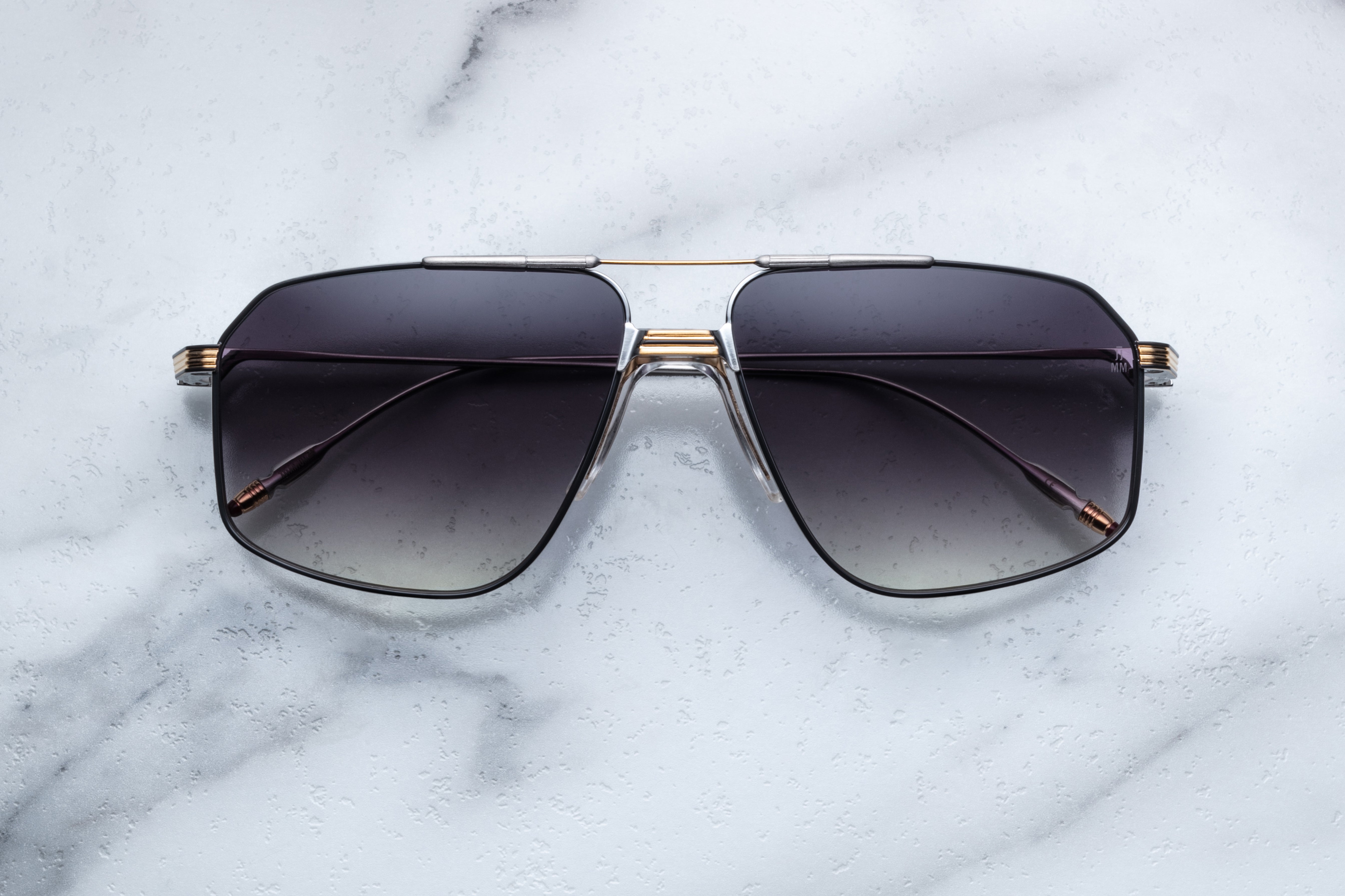 Jacques Marie Mage Jagger sunglasses with sleek, aerodynamic frame and tinted lenses, front view showing stylish design