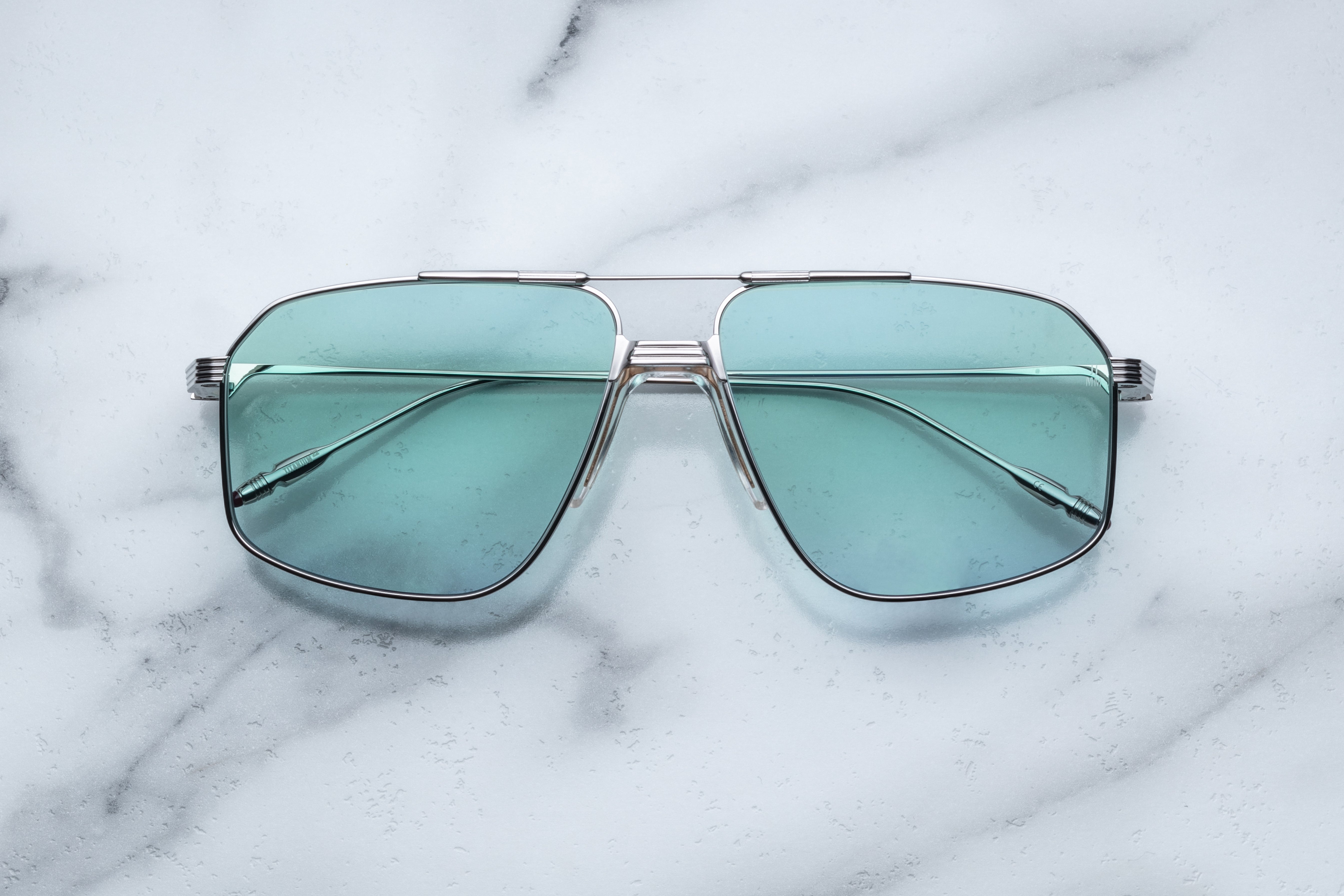 Jacques Marie Mage JAGGER sunglasses with rounded frames and tinted lenses, shown from the front on a white background.