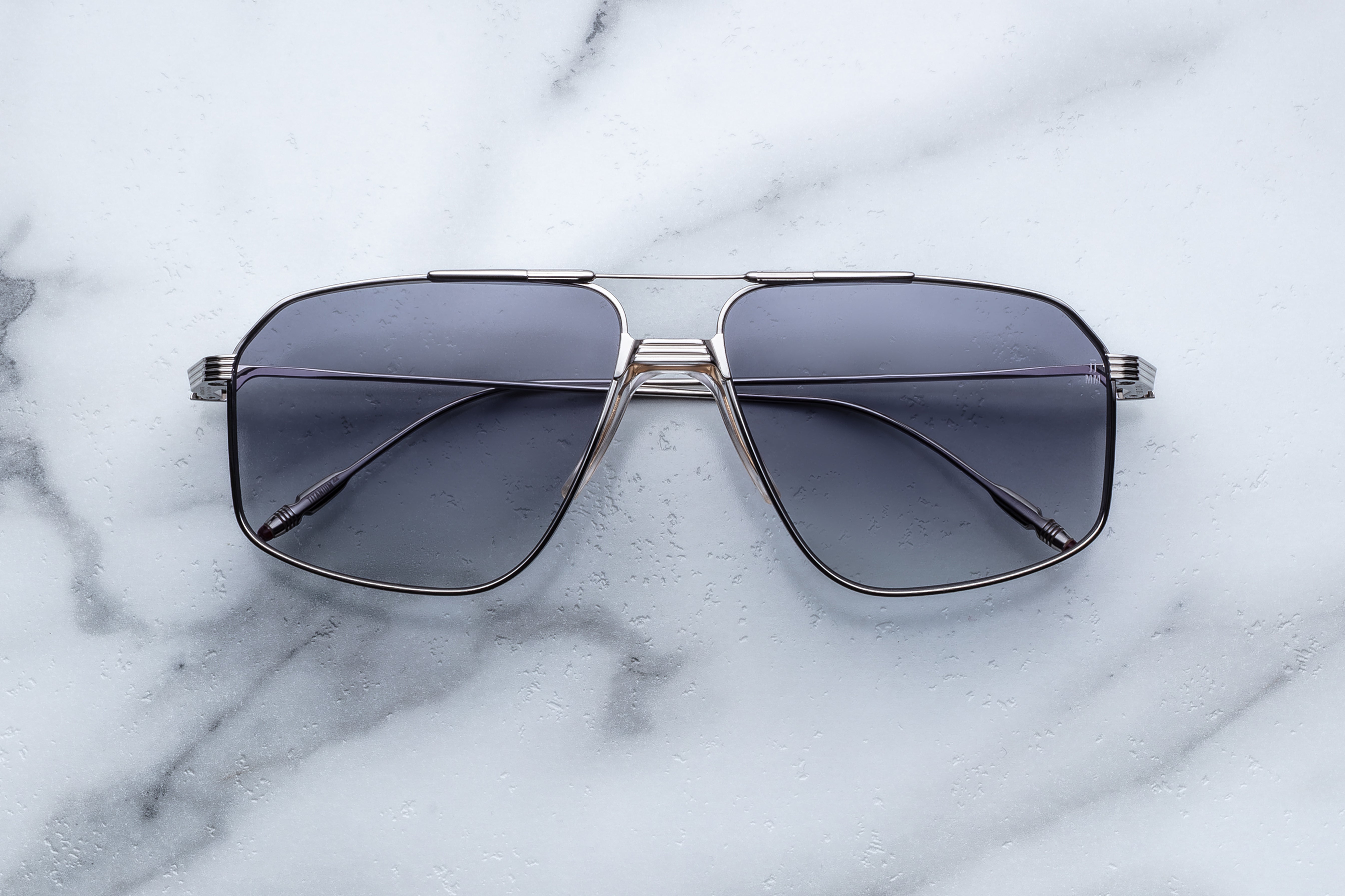 Jacques Marie Mage JAGGER sunglasses with sulfur-colored frames and dark lenses, front view showing sleek design.