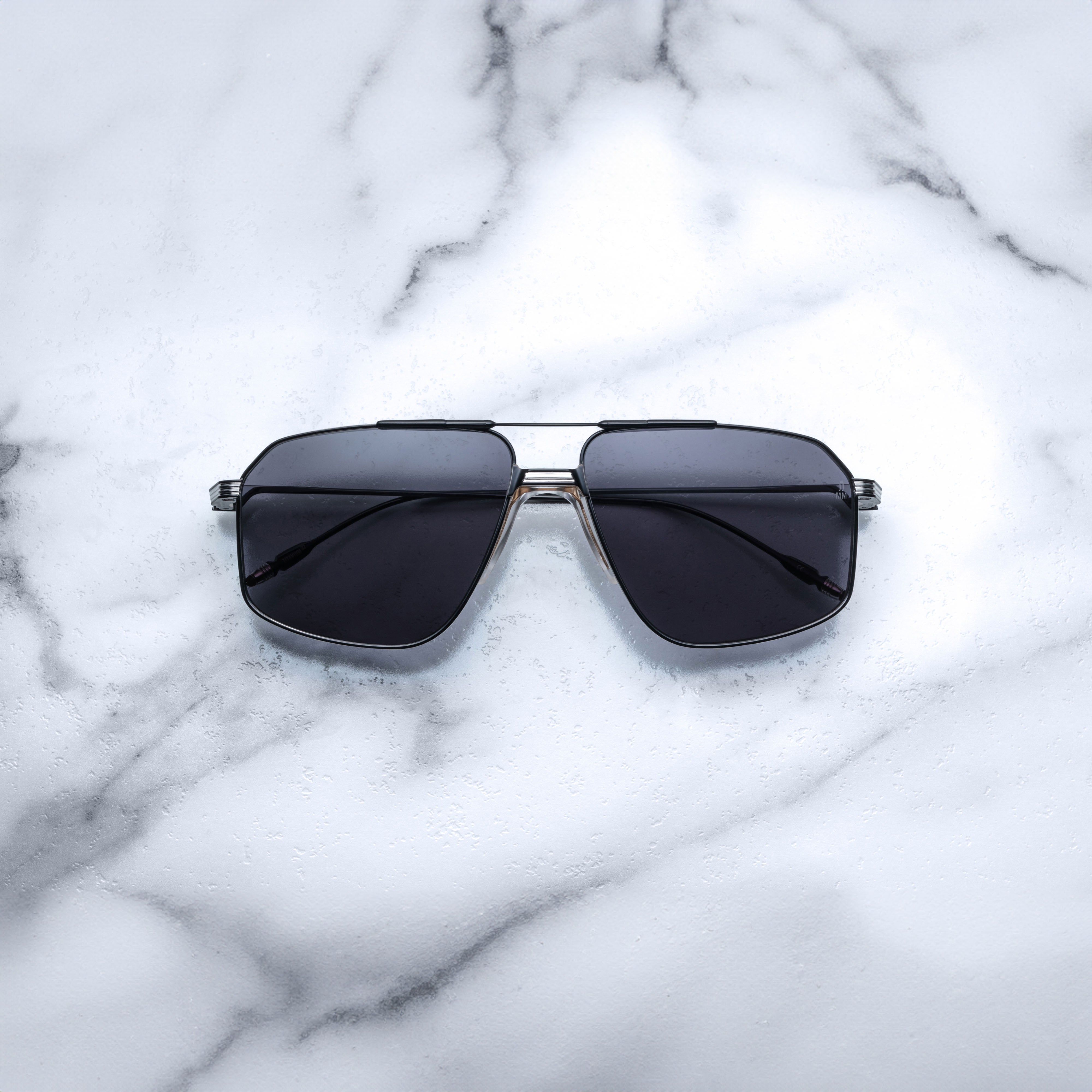Jacques Marie Mage JAGGER sunglasses with sleek frame and tinted lenses, shown from the front view.