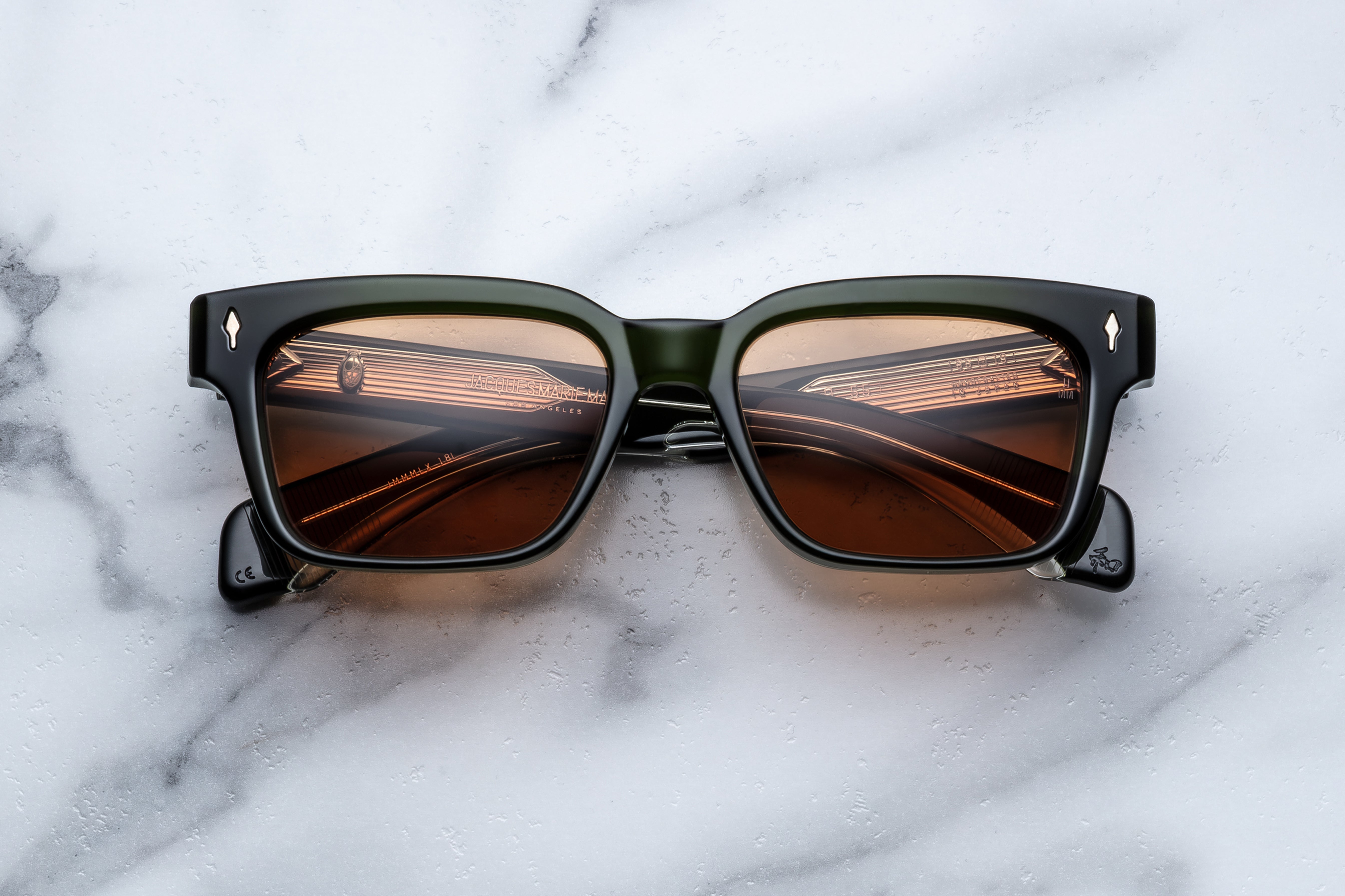 Jacques Marie Mage Molino 55 sunglasses with Borneo tortoise shell frames, front view showing stylish design and glossy finish.