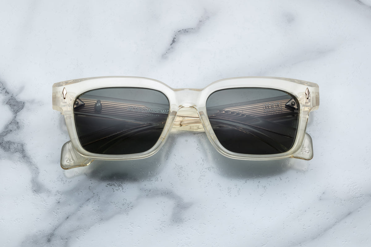 Jacques Marie Mage Molino 55 sunglasses with bold, rectangular frames and dark lenses, front view.