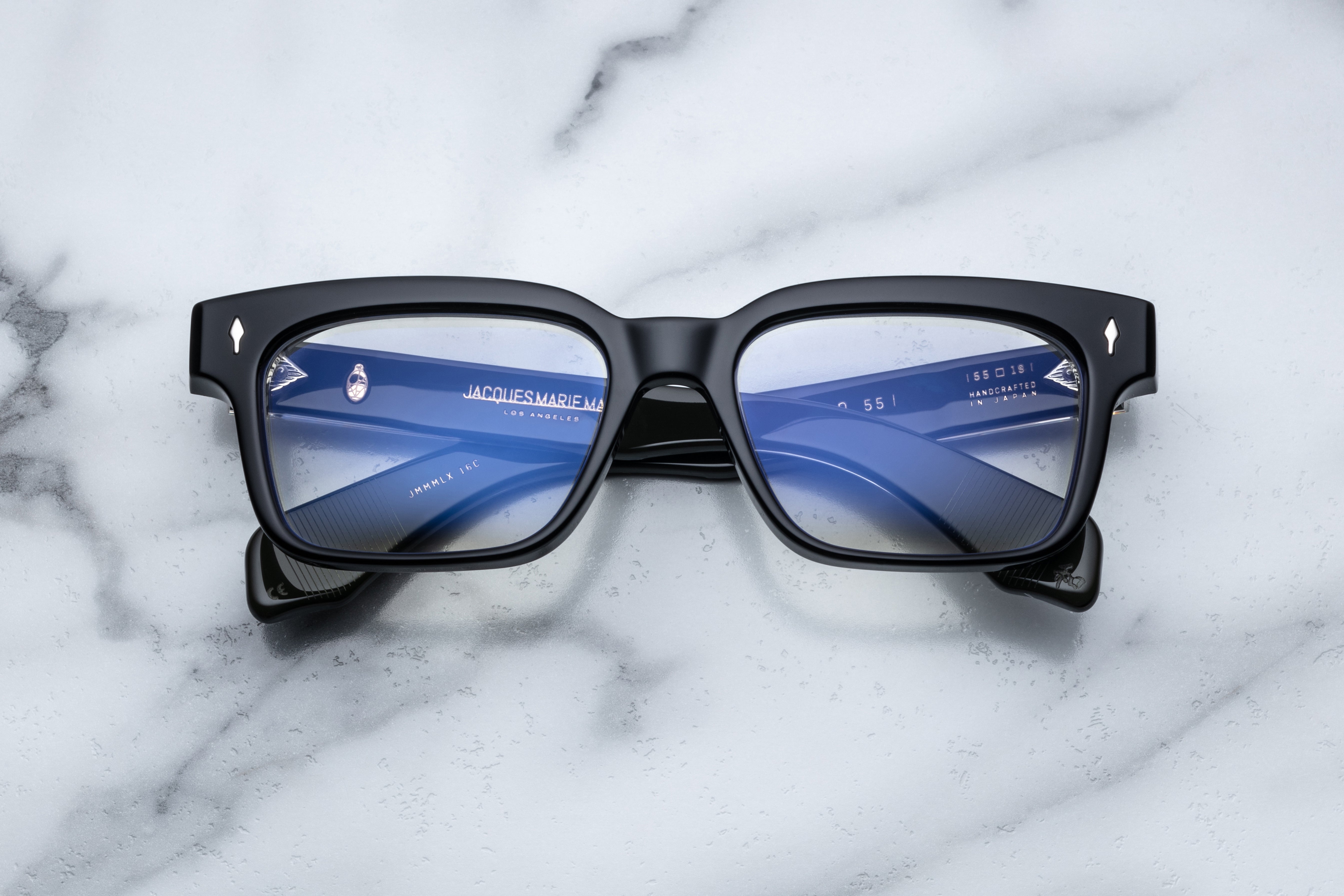 Optical eyewear mount by Jacques Marie Mage, Molino 55 Cobra RX model, front view showing detailed design and frame shape.