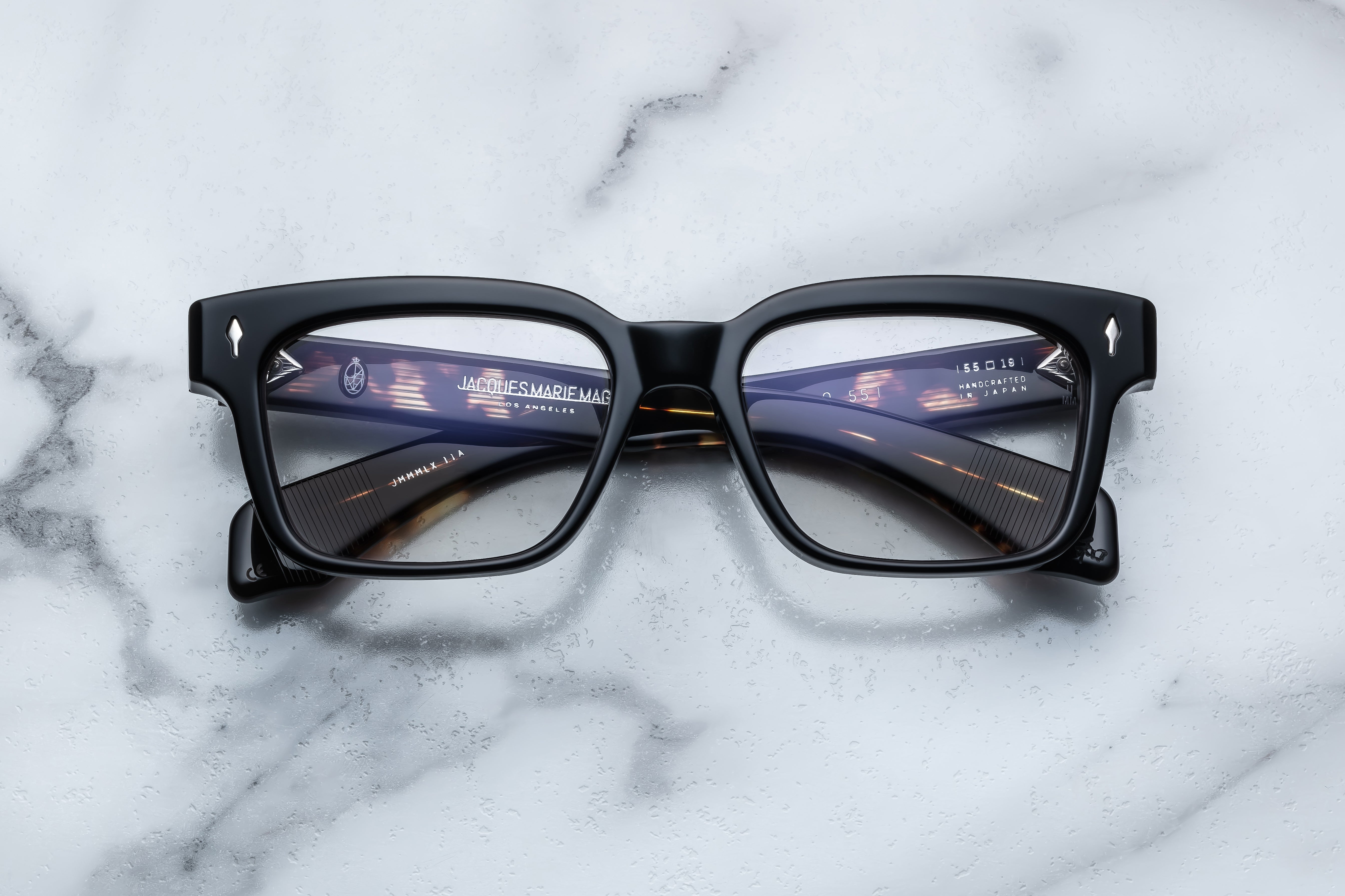 Jacques Marie Mage Molino 55 optical glasses with black frame, front view showing sleek design and clear lenses.