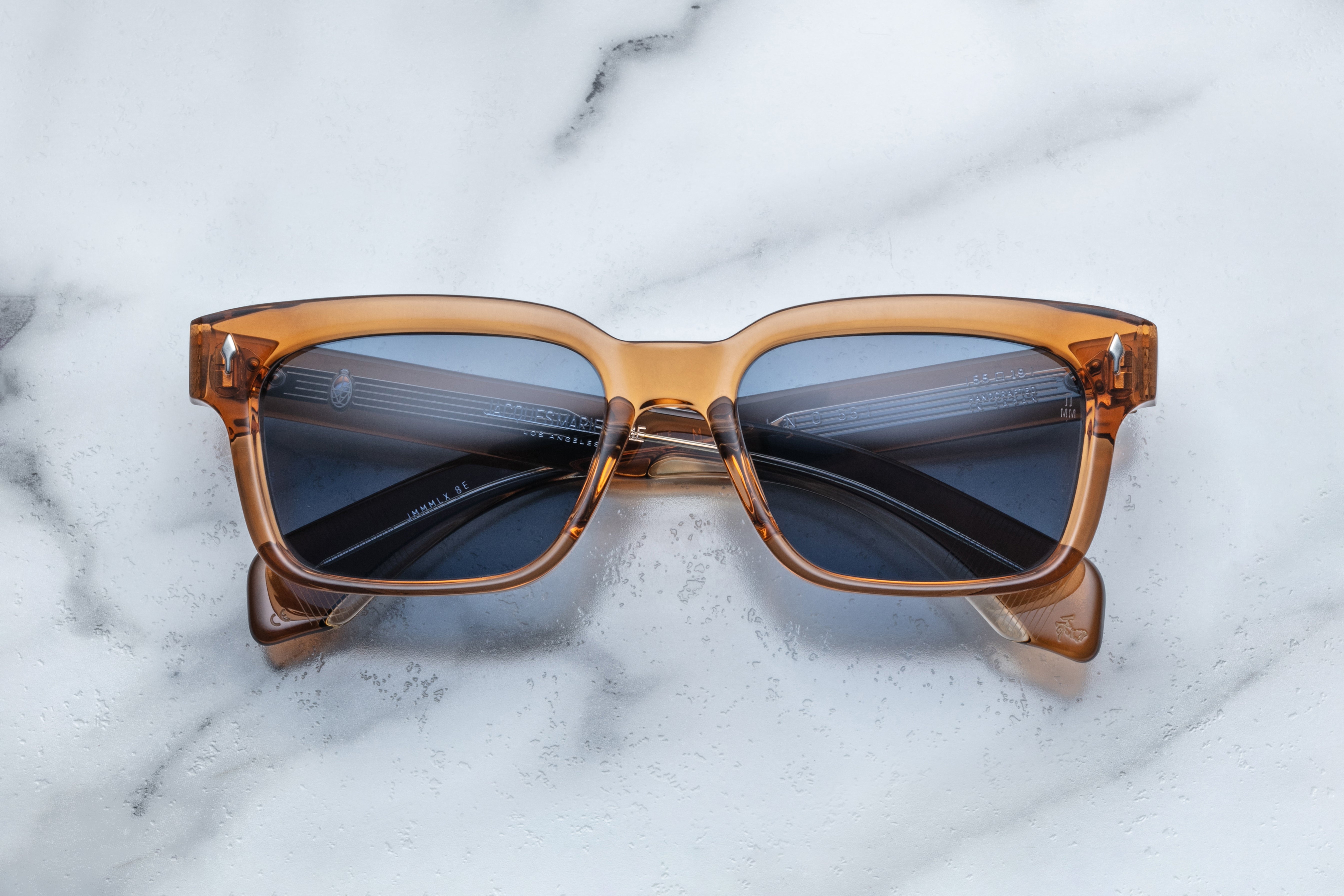 Jacques Marie Mage Molino 55 sunglasses with whiskey-colored frames, front view showing sleek design and tinted lenses.