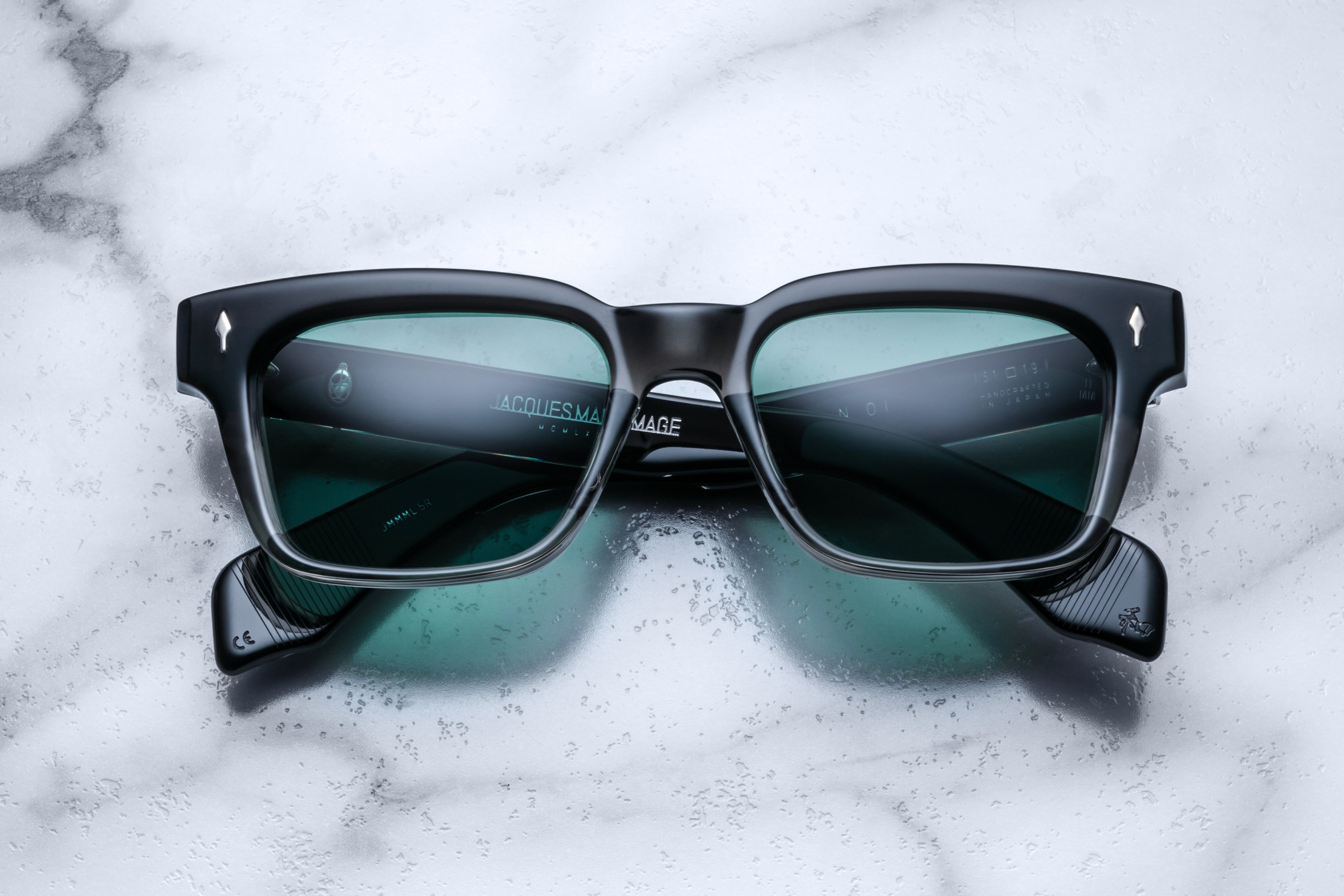 Jacques Marie Mage Molino black fade sunglasses with round frames and clear lenses, showcasing stylish eyewear design.