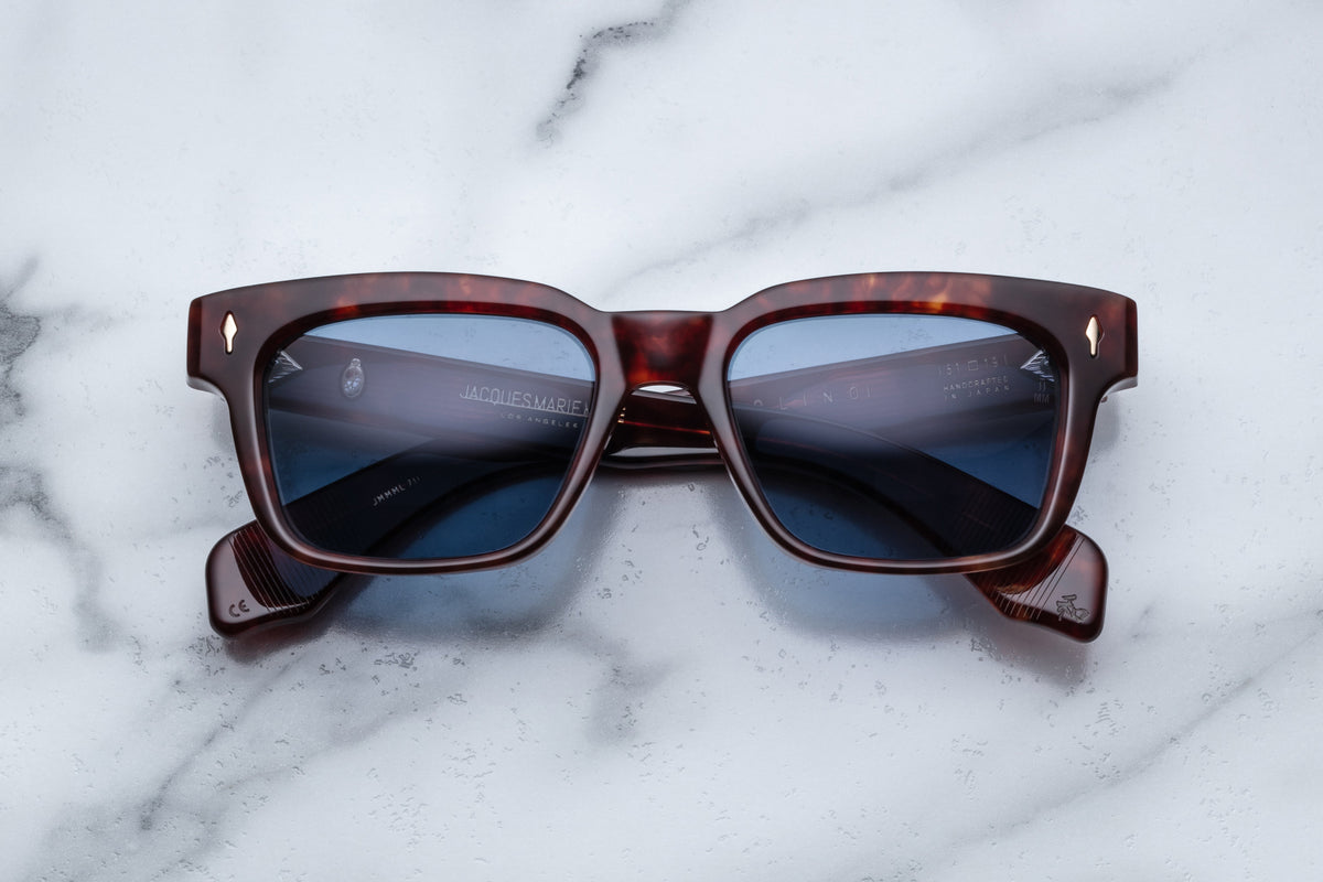 Jacques Marie Mage Molino sunglasses with Breccia-colored frames and clear lenses, front view showing stylish, modern design.
