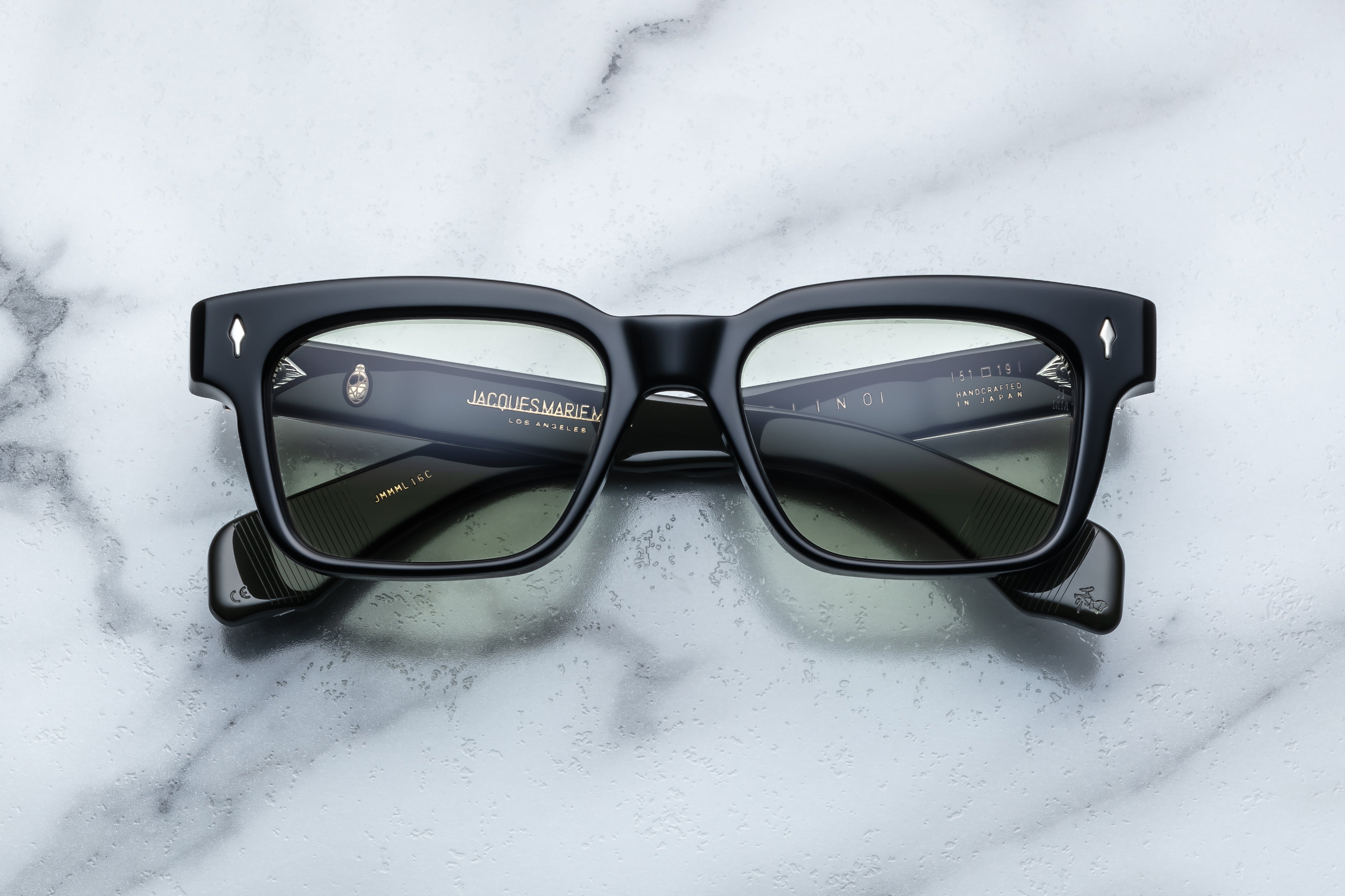 Jacques Marie Mage Molino Cobra sunglasses with tortoiseshell frames and tinted lenses, front view showcasing stylish design.