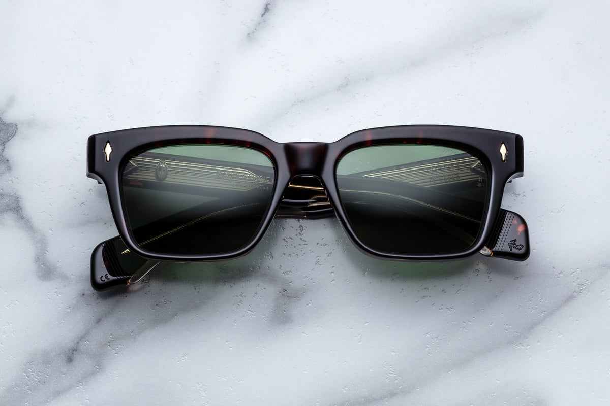 Jacques Marie Mage Molino sunglasses with round frames and tinted lenses, shown from the front view.