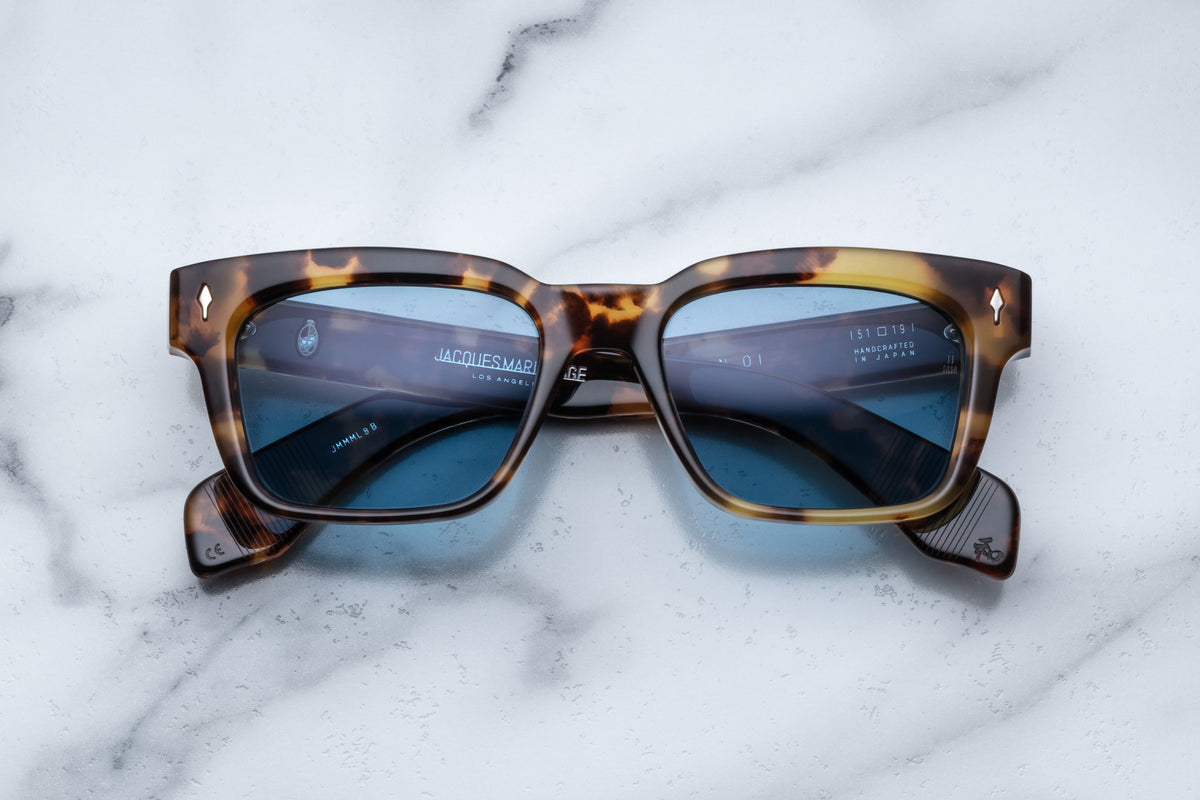 Jacques Marie Mage Molino Havana sunglasses with rounded frame and tinted lenses, front view showing stylish design.
