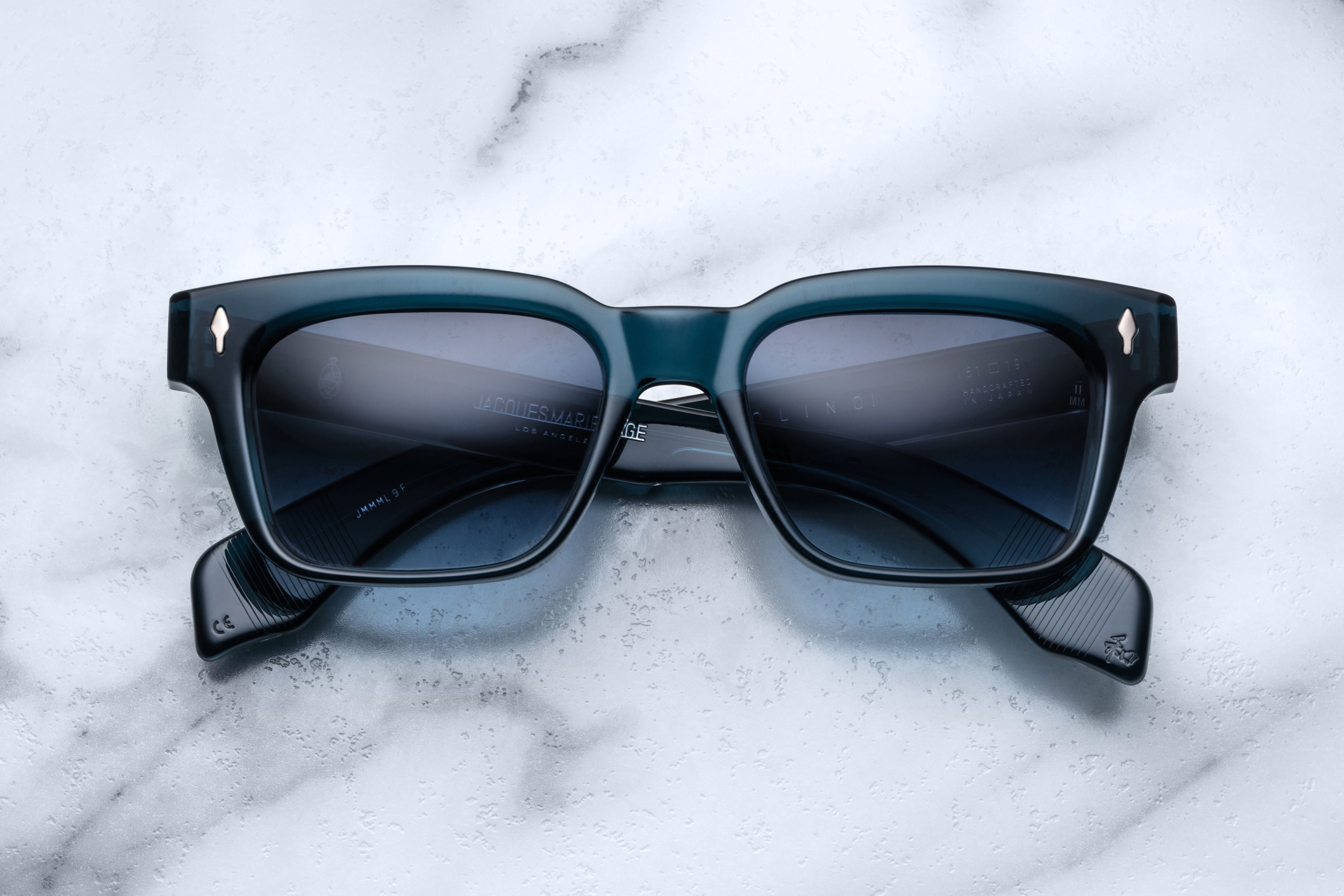 Jacques Marie Mage Molino Indigo sunglasses with a sleek front view showcasing their stylish design and tinted lenses.