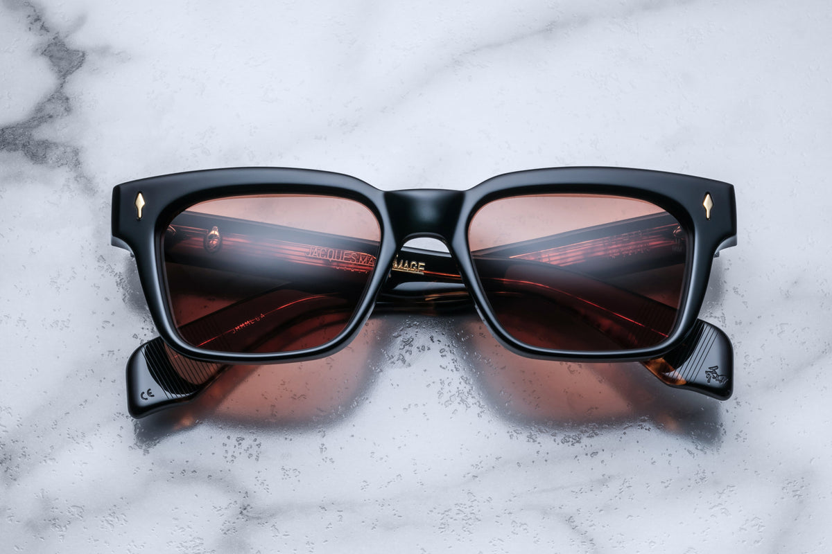 Jacques Marie Mage Molino Noir sunglasses with black frame and clear lenses, front view showing stylish design and high-quality craftsmanship.