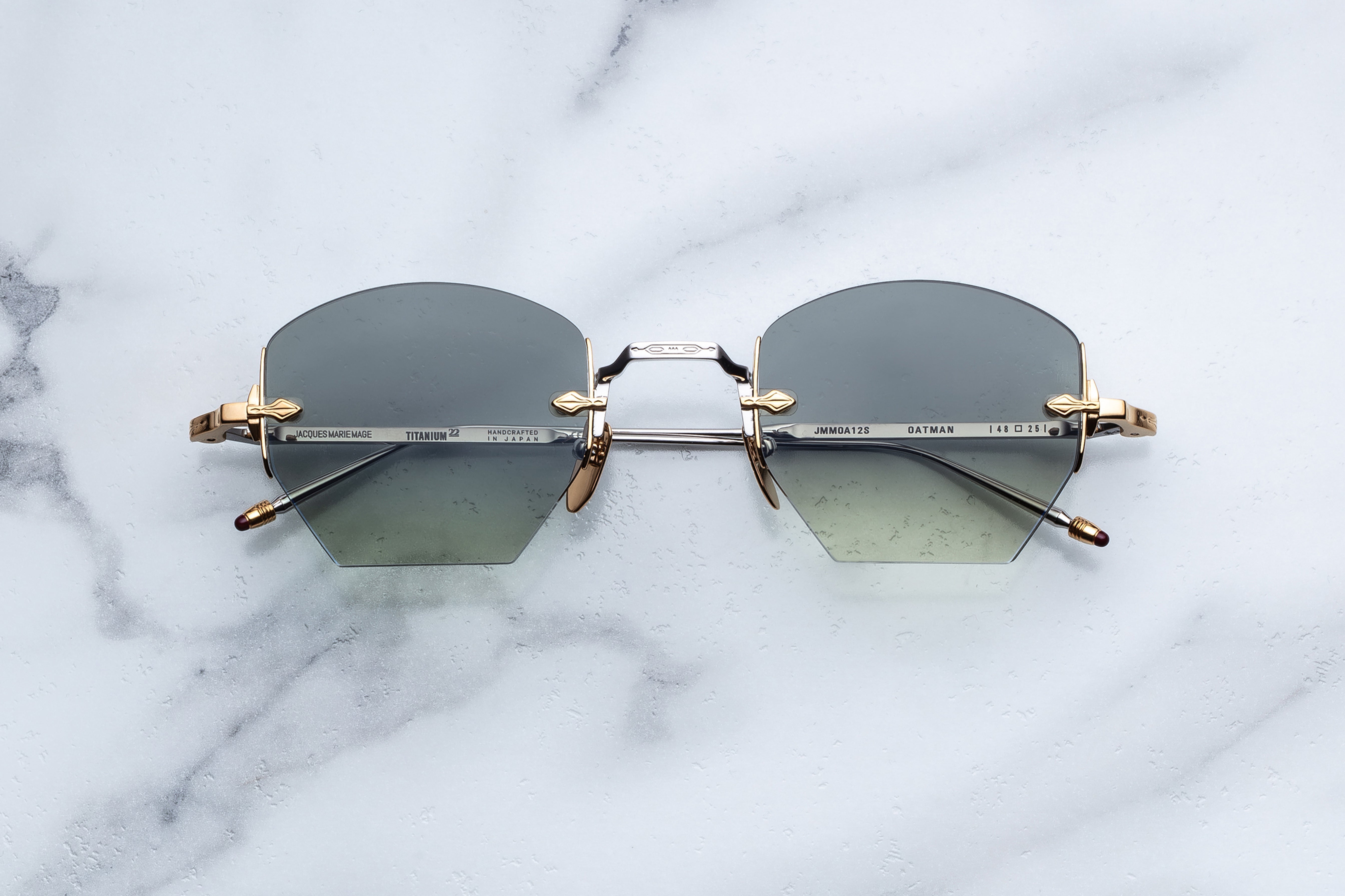 Jacques Marie Mage Oatman sunglasses with Electrum metal frames and dark tinted lenses, front view showing stylish design.