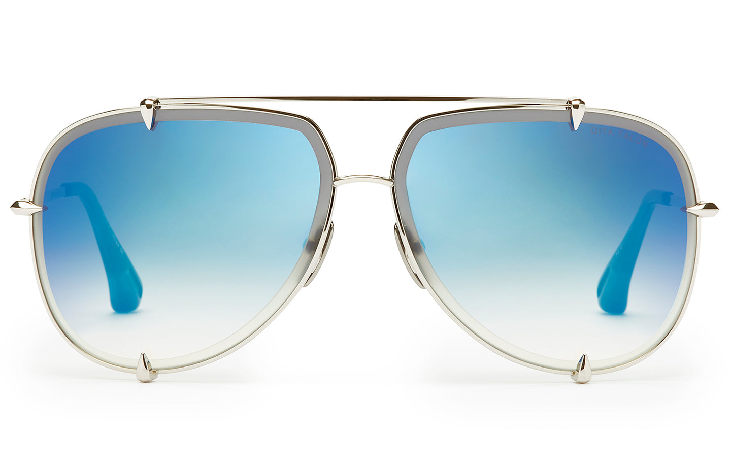 Dita Talon sunglasses with silver frame and clear lenses, showcasing sleek, modern design and stylish craftsmanship.