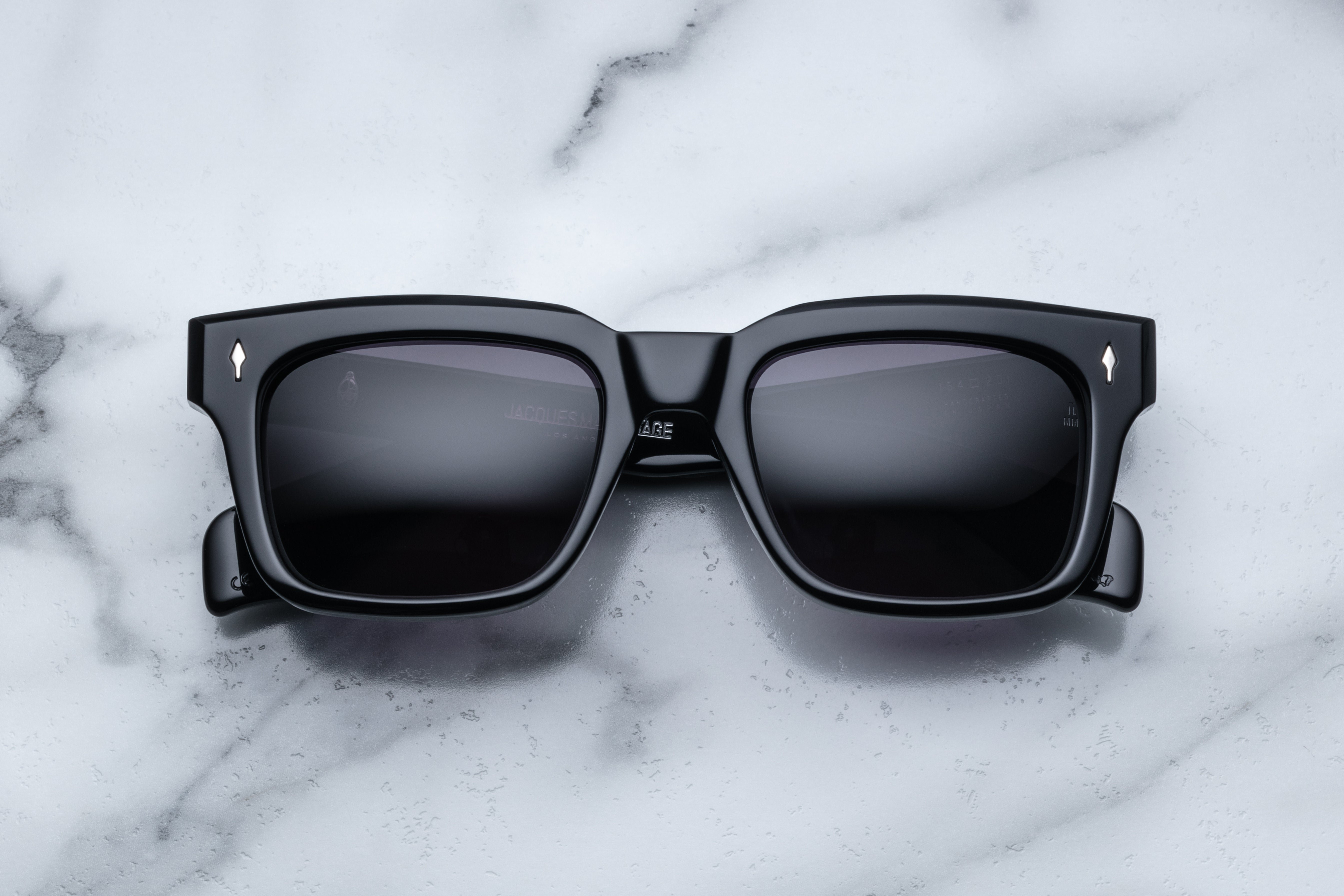 Jacques Marie Mage Torino black sunglasses with a sleek front view and modern design.
