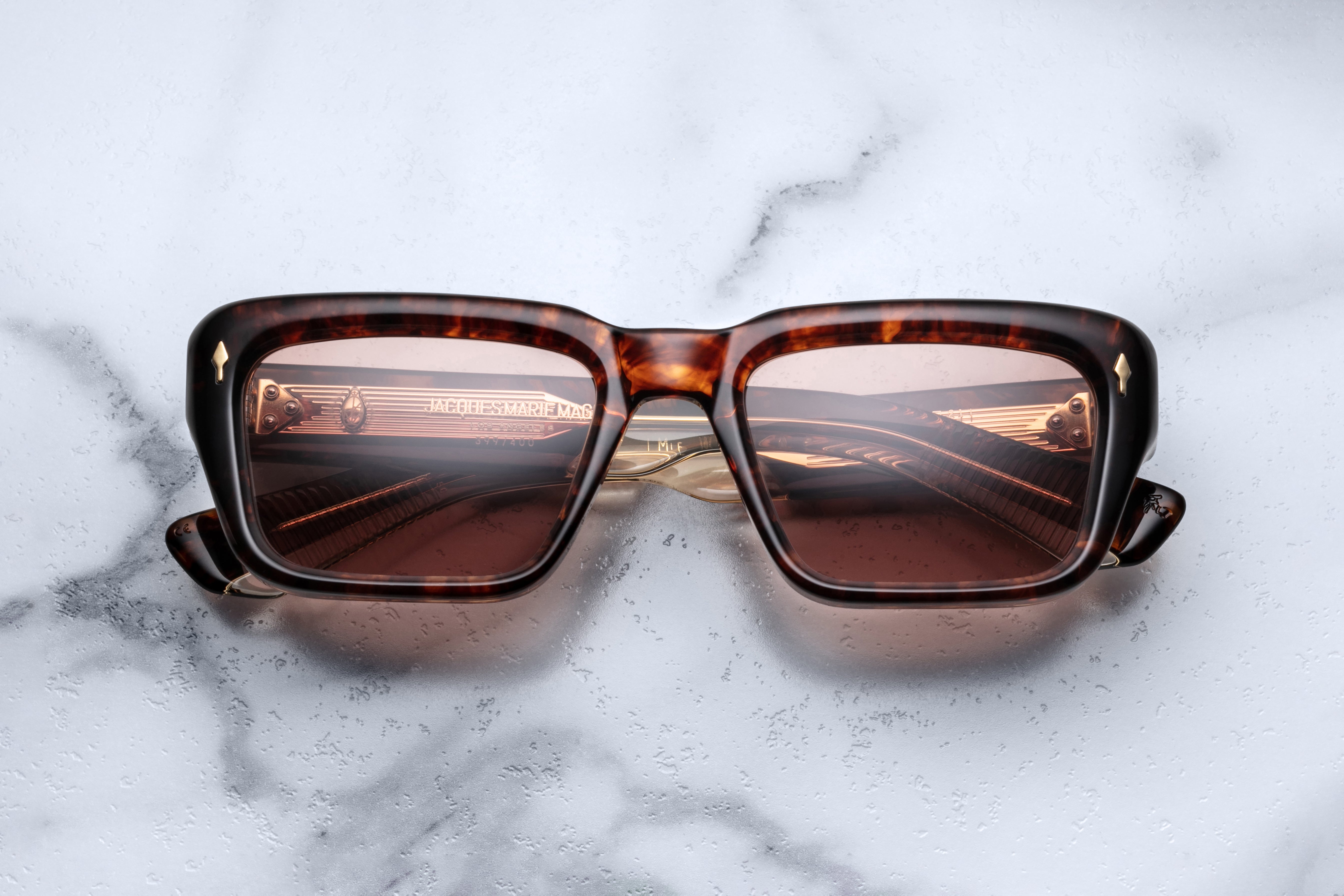 Jacques Marie Mage Walker sunglasses with argyle pattern on the front, stylish and modern eyewear for fashion and UV protection.