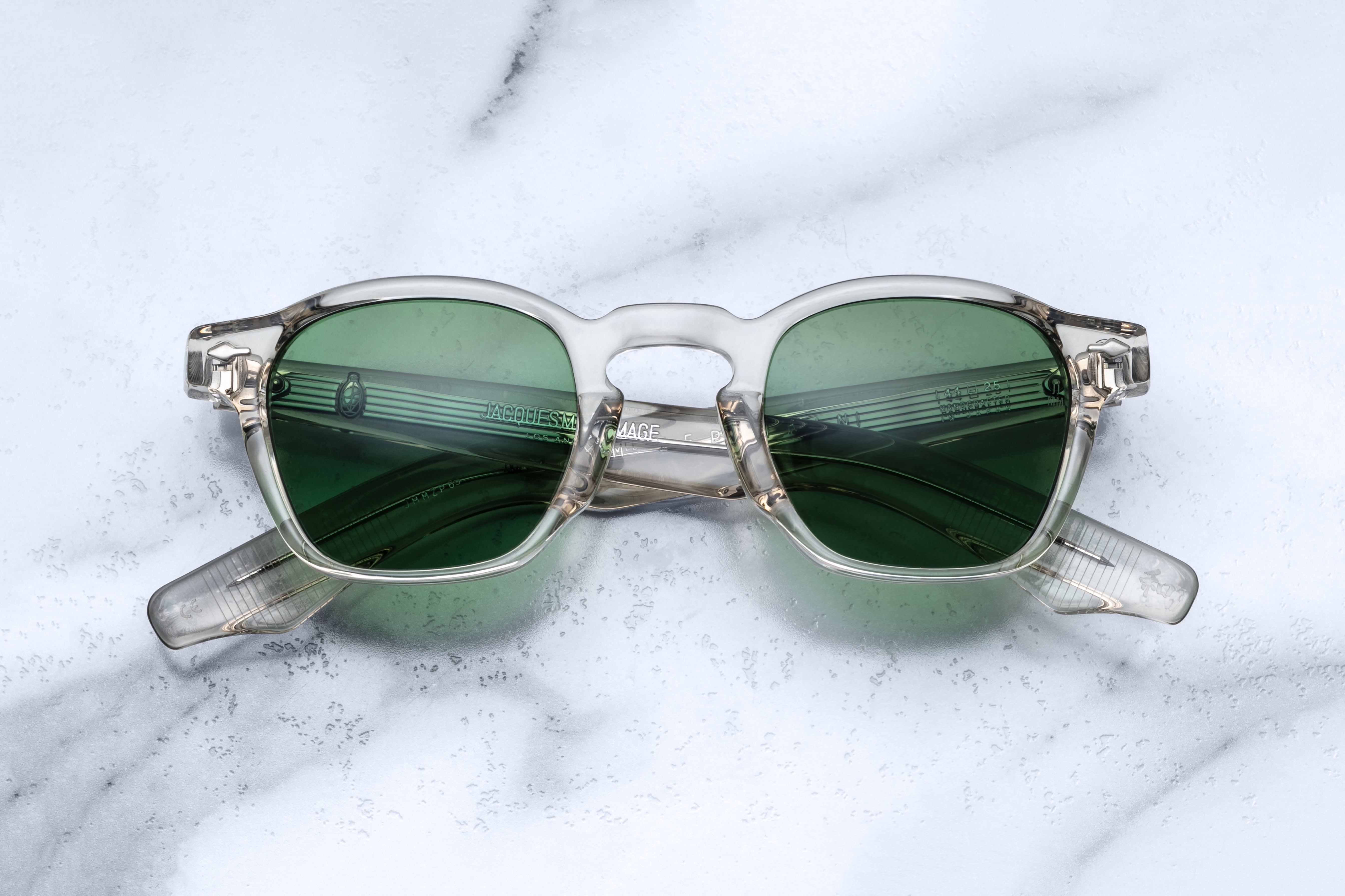 Jacques Marie Mage Zephirin beige sunglasses with rounded frames and clear lenses, close-up front view.