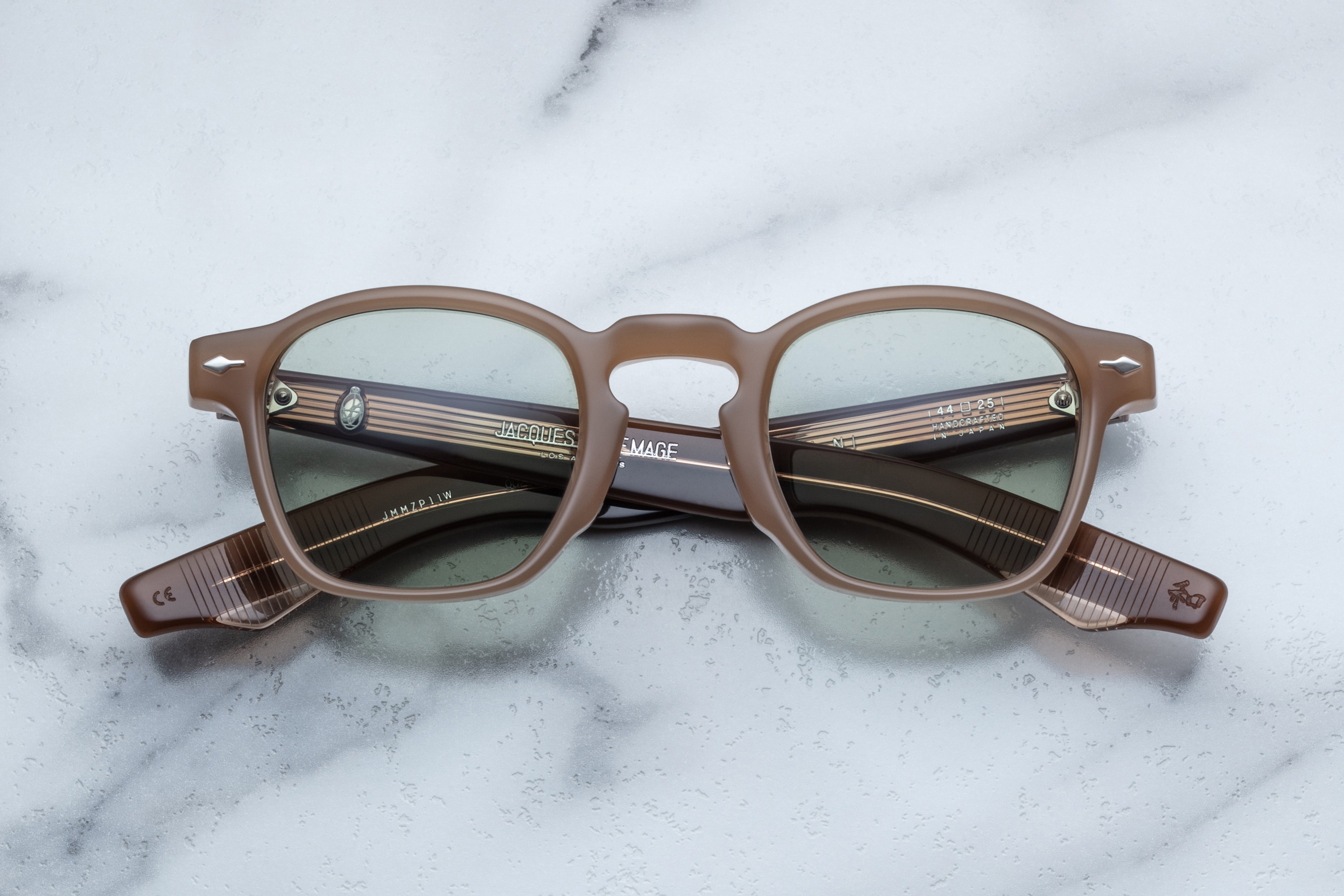 Jacques Marie Mage Zephirin sunglasses in birch with round frames and clear lenses, front view showing detailed design.