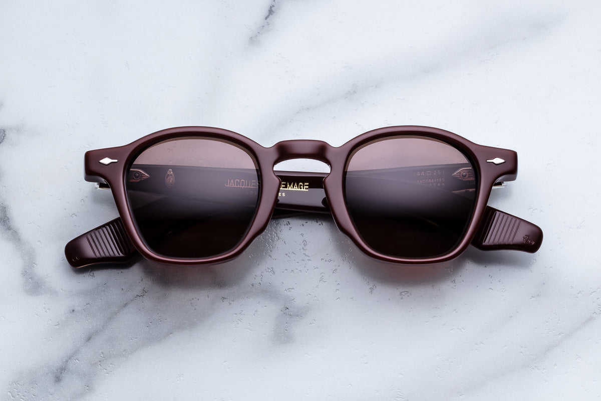 Jacques Marie Mage Zephirin Bordeaux sunglasses with rounded frames and tinted lenses, front view.