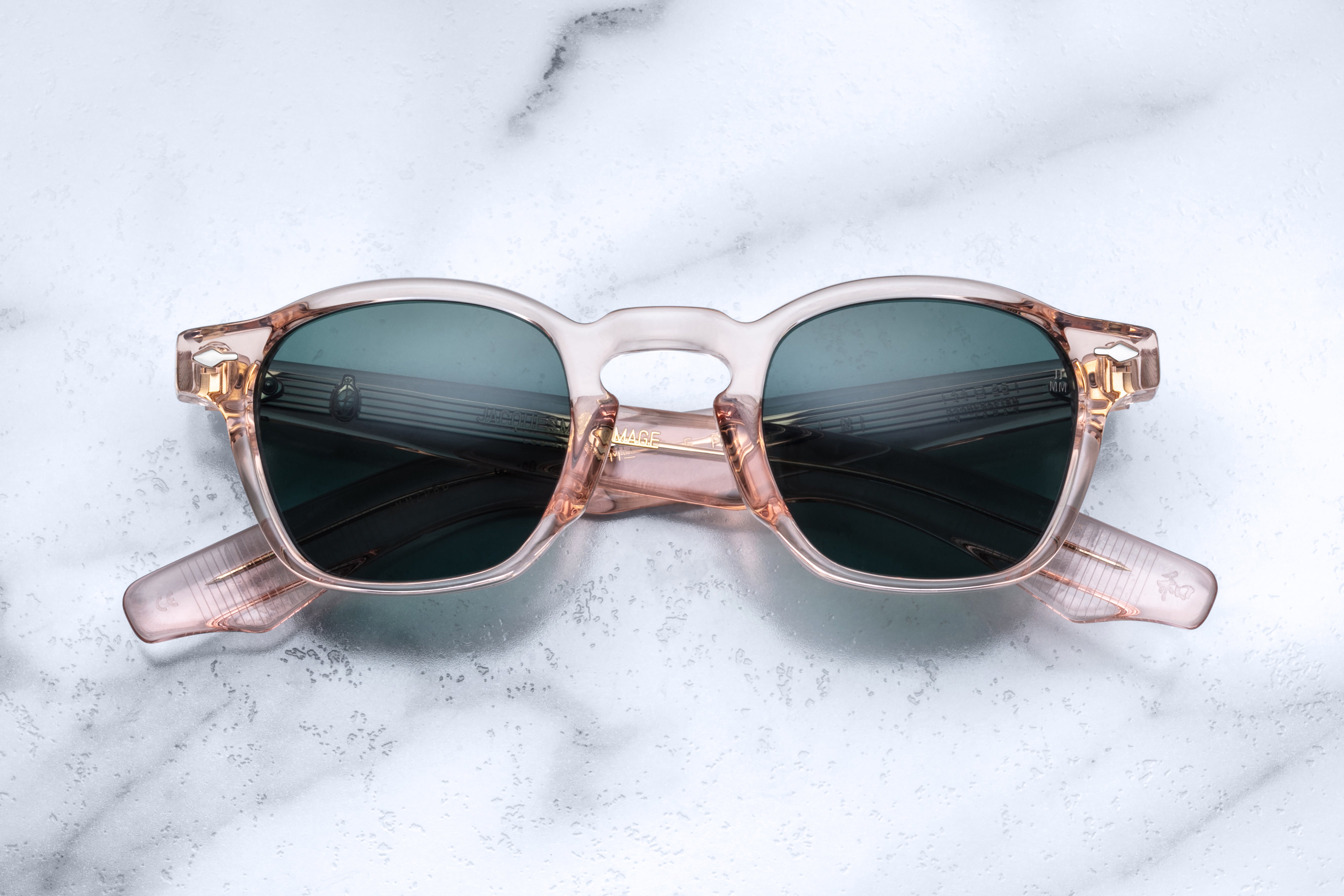 Jacques Marie Mage Zephirin Dahlia sunglasses with rounded frames and tinted lenses, displayed from the front view.