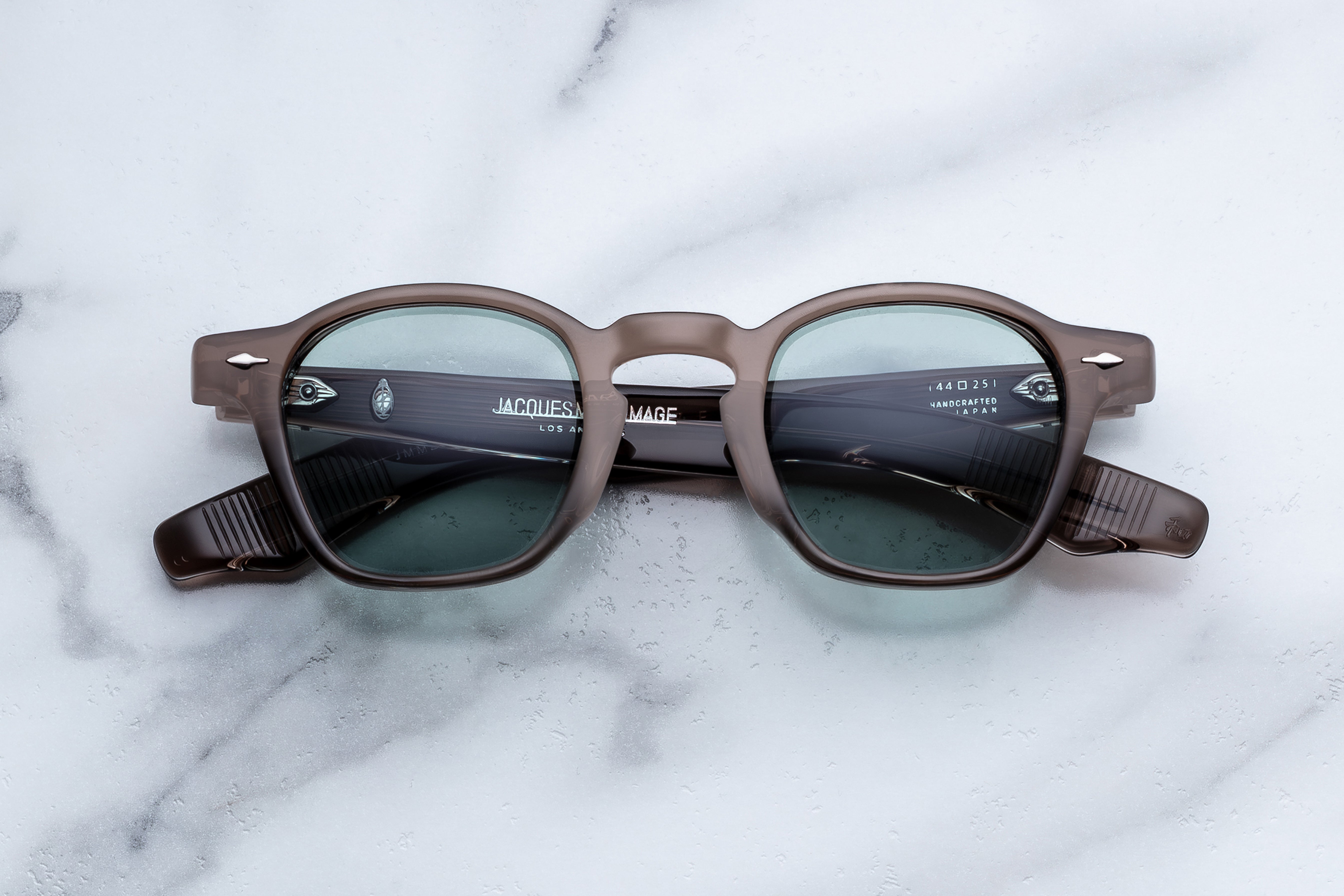 Jacques Marie Mage Zephirin sunglasses with dusty jade frames, front view showing sleek design and tinted lenses.