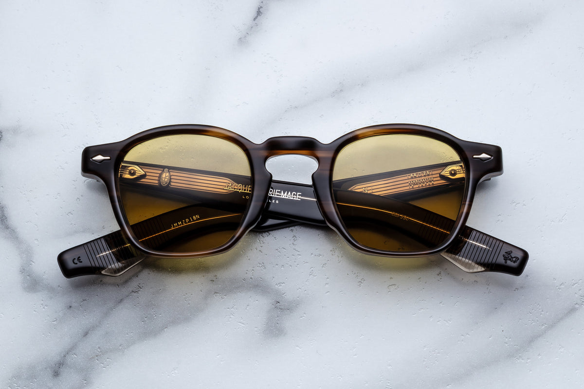 Jacques Marie Mage Zephirin Hazel sunglasses with round frames and tinted lenses, front view showing detailed design.