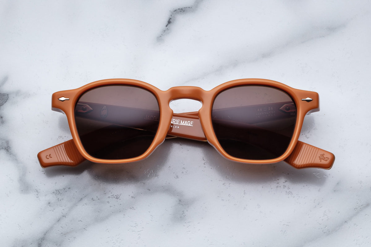 Jacques Marie Mage Zephirin sunglasses with bold red frames and clear lenses, front view highlighting stylish design.