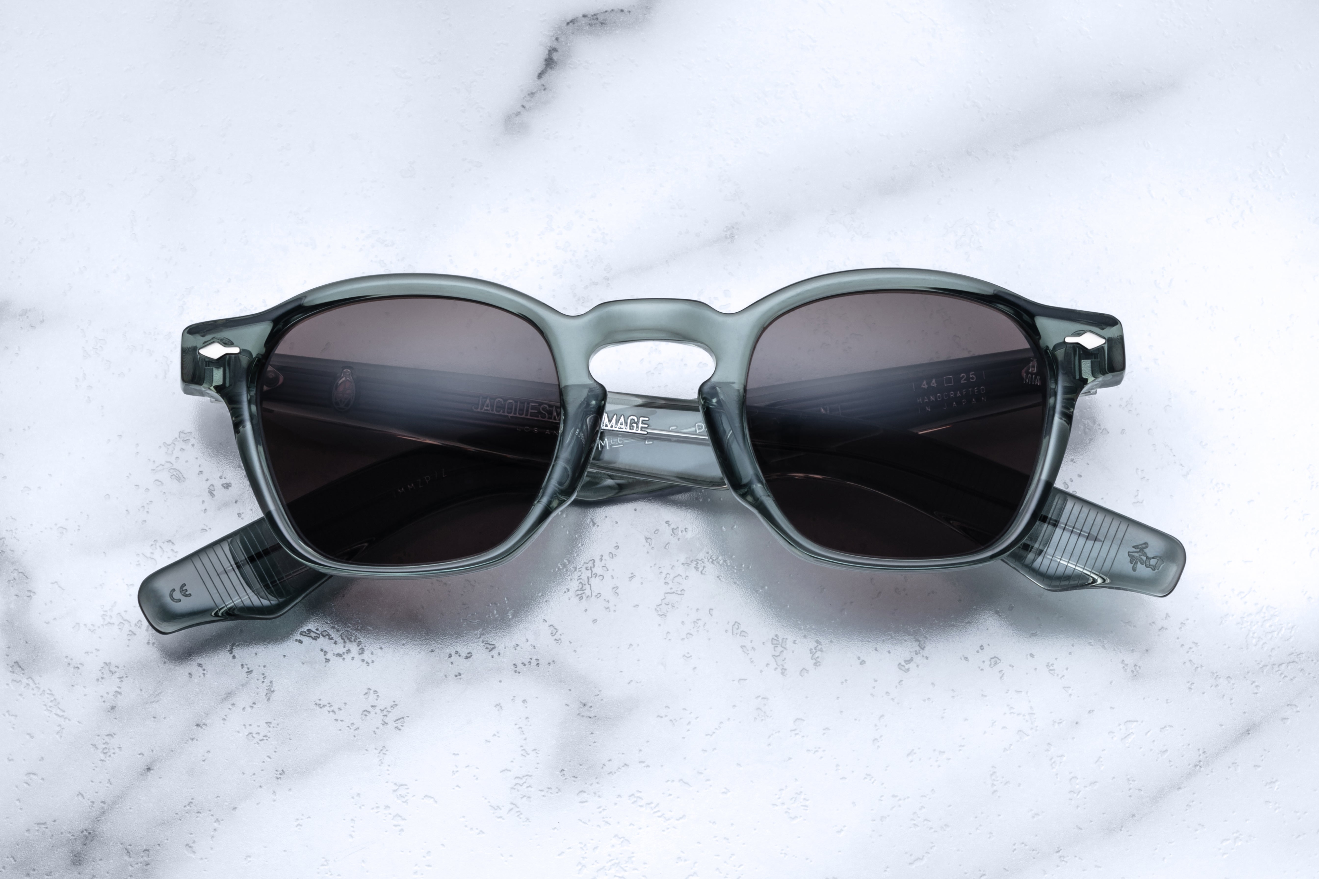 Jacques Marie Mage Zephirin Juniper sunglasses with rounded frames and clear lenses, front view showing stylish design.