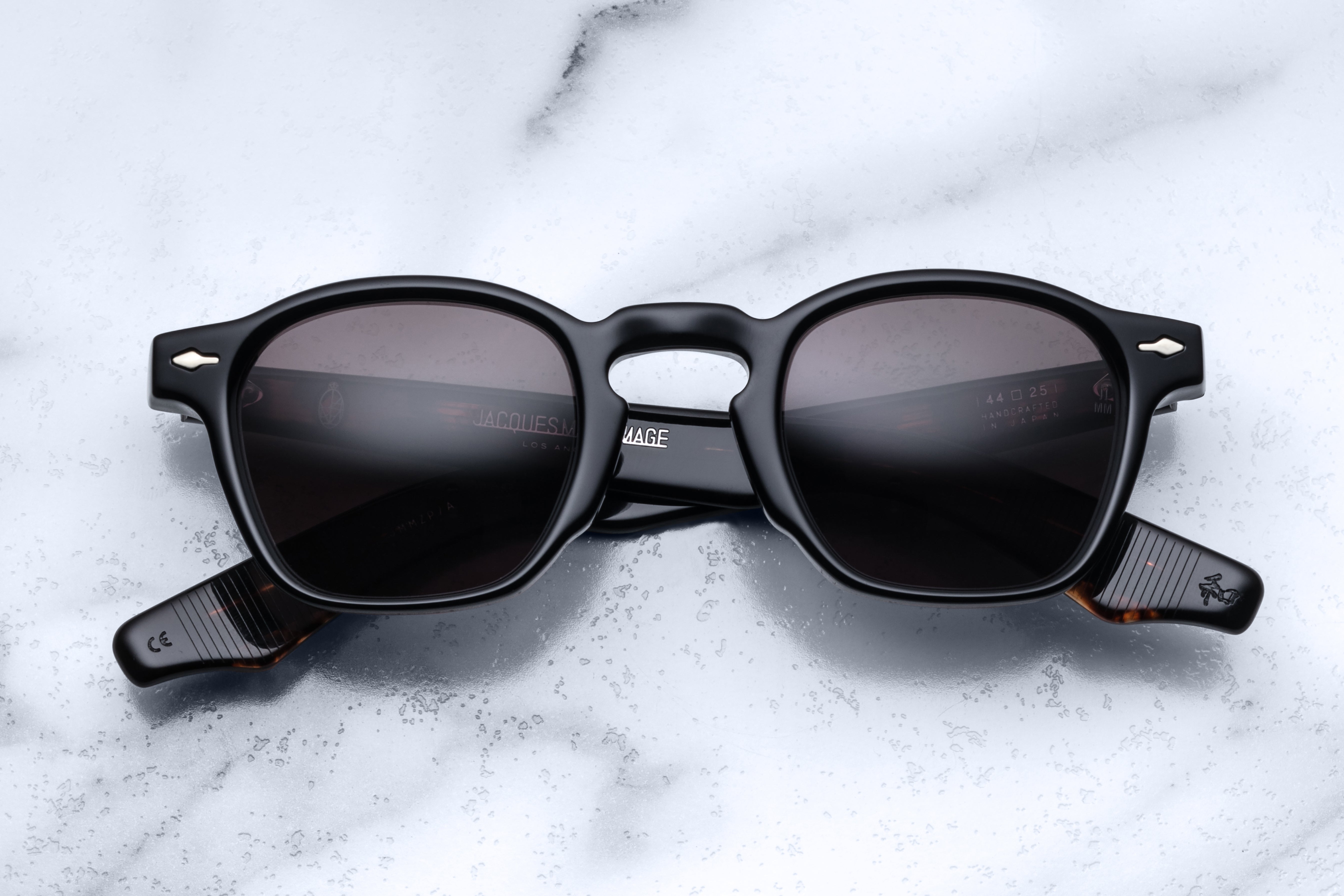 Jacques Marie Mage Zephirin Noir sunglasses with black frame and clear lenses, front view showing sleek design.