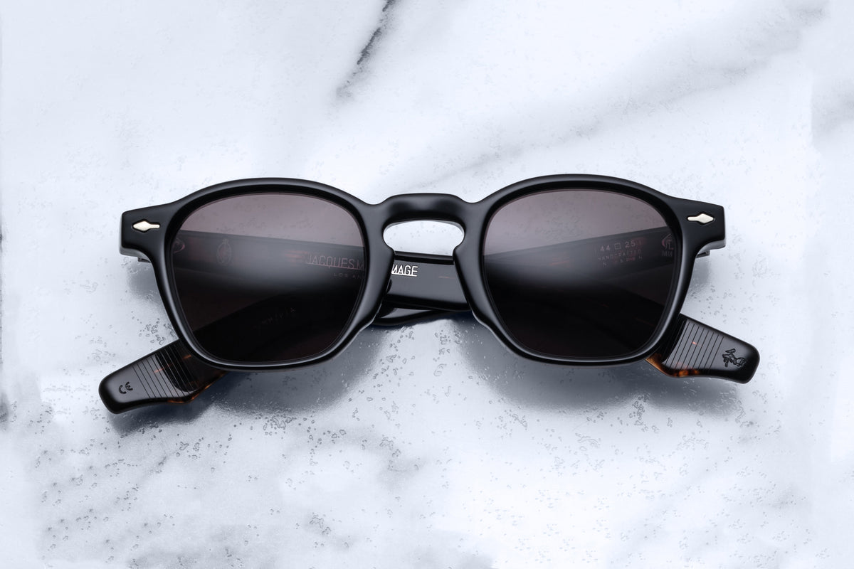 Jacques Marie Mage Zephirin noir sunglasses with sleek black frame and clear lenses, front view showing stylish design.