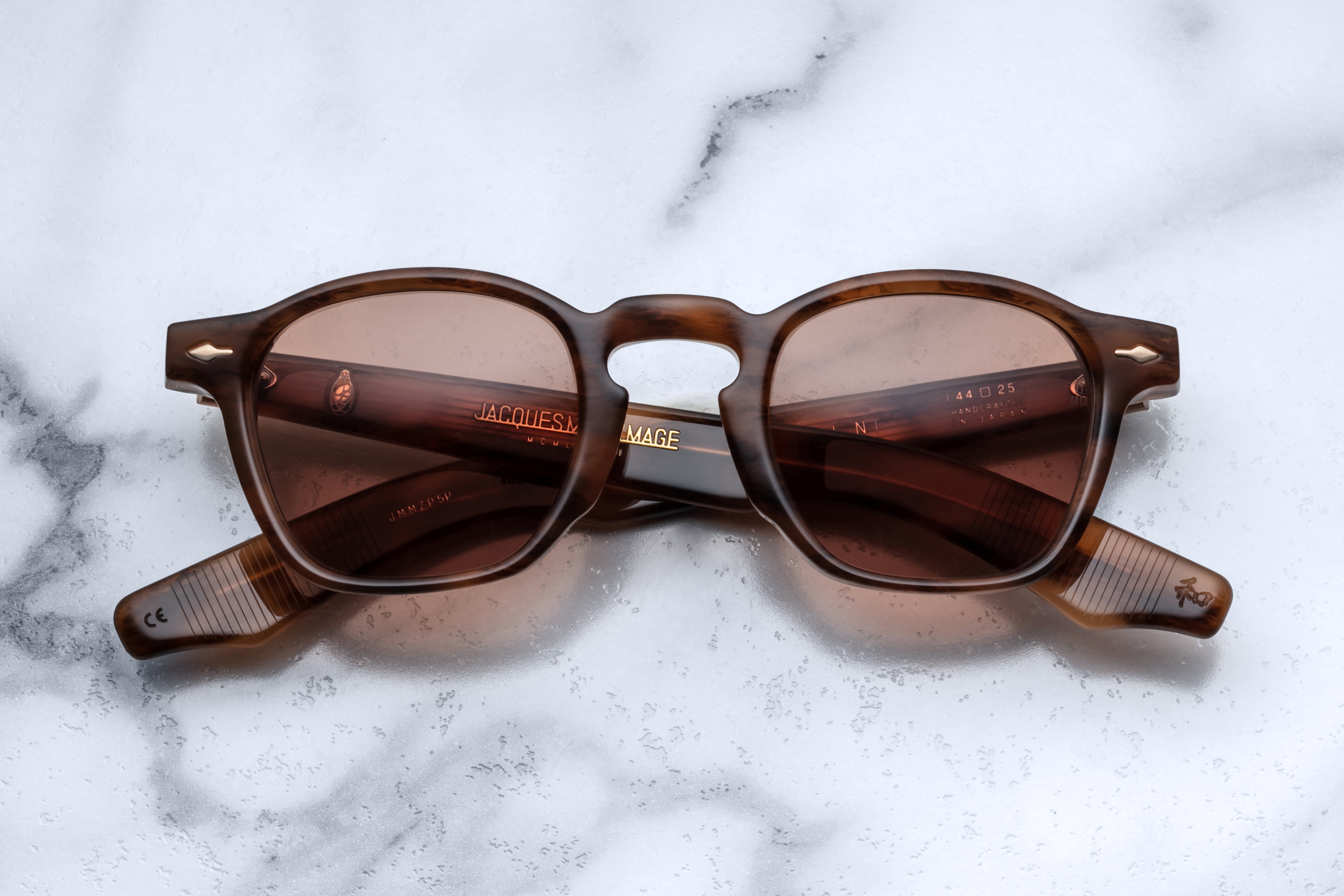 Jacques Marie Mage Zephirin Oak sunglasses with rounded frames and dark tinted lenses, stylish and modern eyewear.