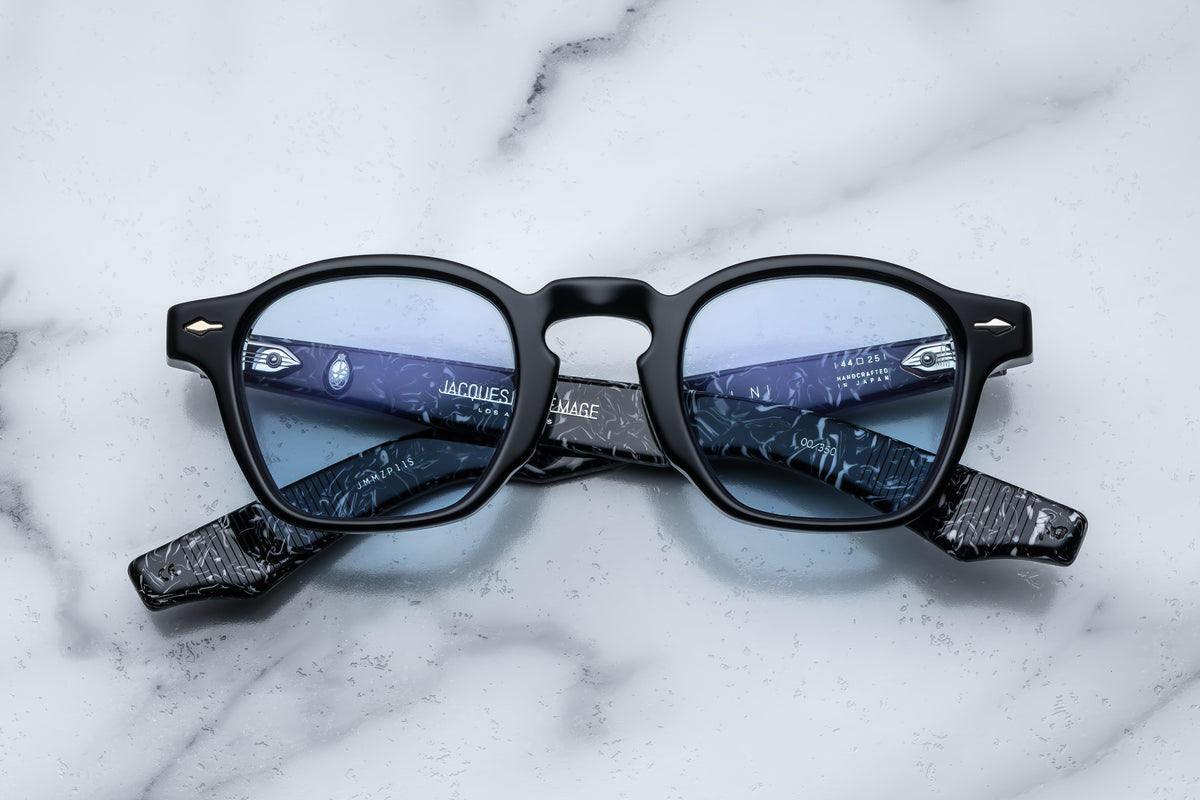 Jacques Marie Mage Zephirin polarized sunglasses with sleek black frames and dark lenses, shown from the front.