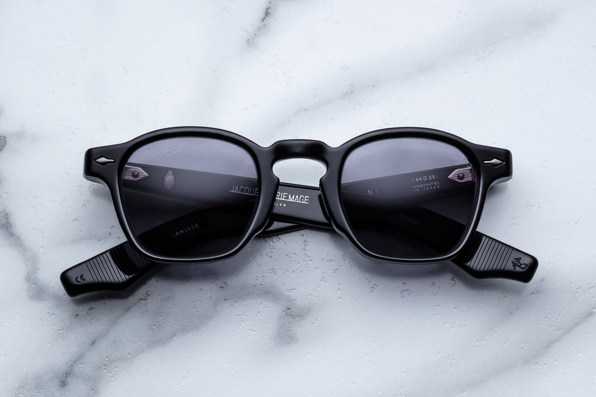 Jacques Marie Mage Zephirin Raven sunglasses with dark tinted lenses and sleek black frame, front view.