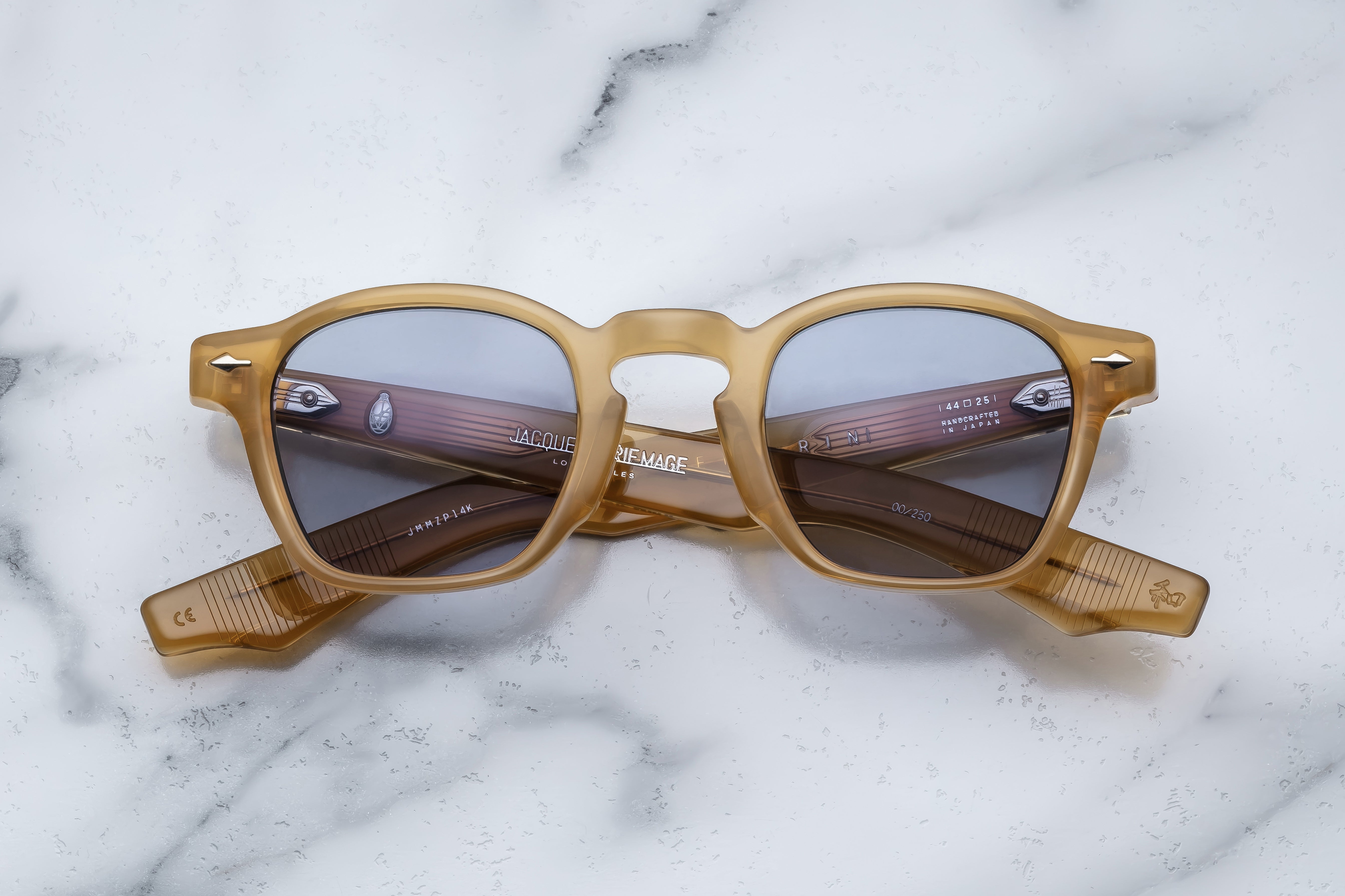 Jacques Marie Mage Zephirin sunglasses with saffron-colored frames and clear lenses, front view showing stylish design.