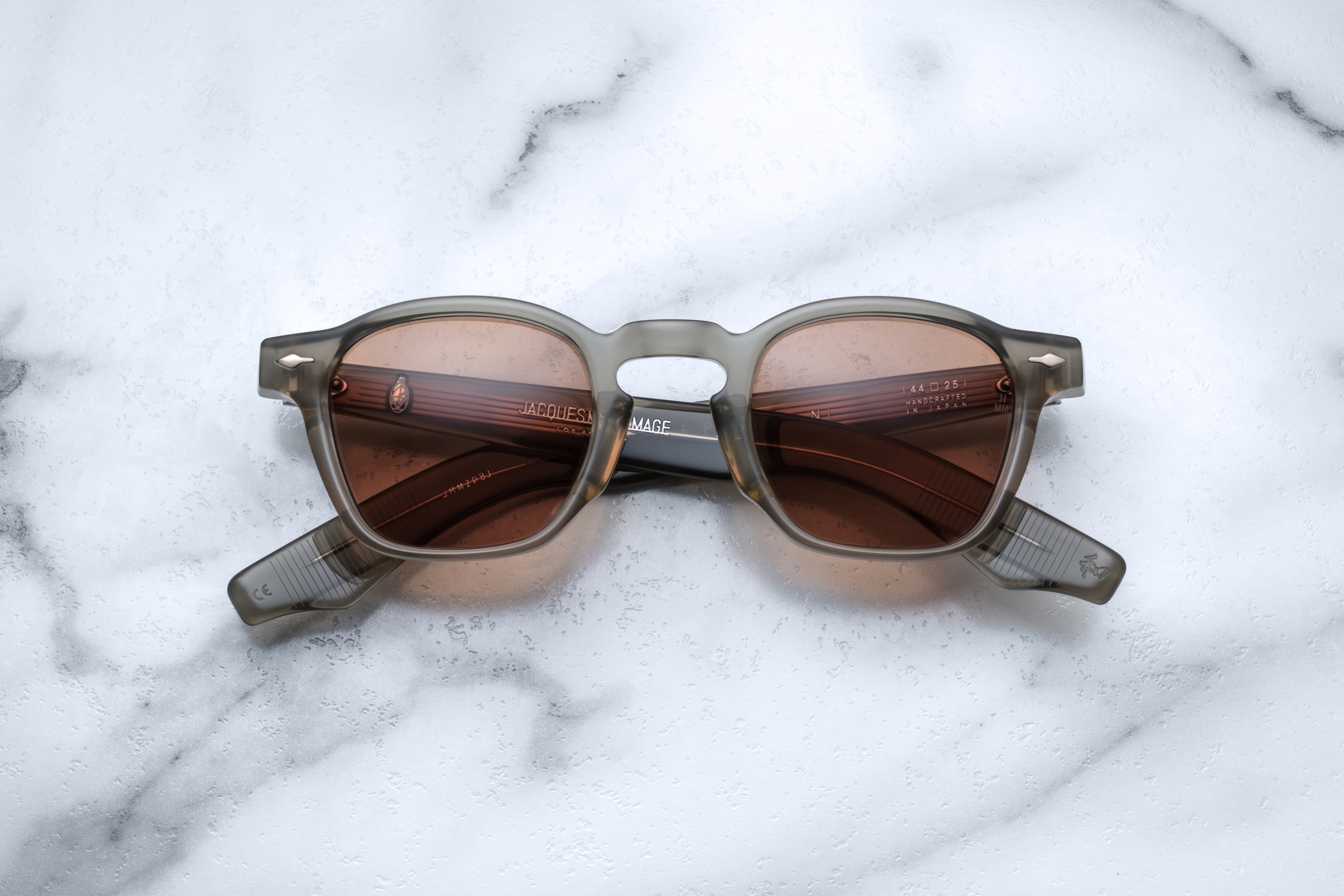 Jacques Marie Mage Zephirin sky grey sunglasses with round frames and clear lenses, front view showing stylish design.