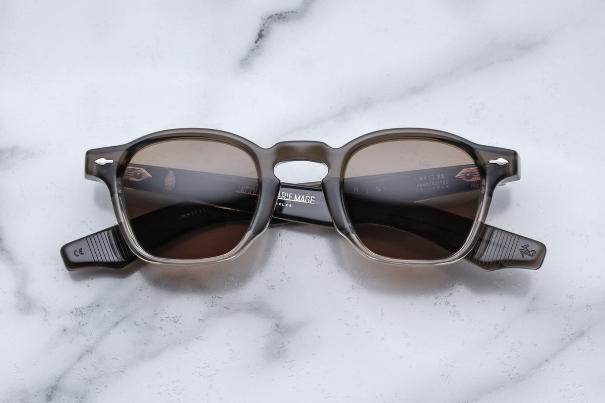 Jacques Marie Mage Zephirin Smoke Fade sunglasses with rounded frames and gradient tinted lenses, close-up front view.