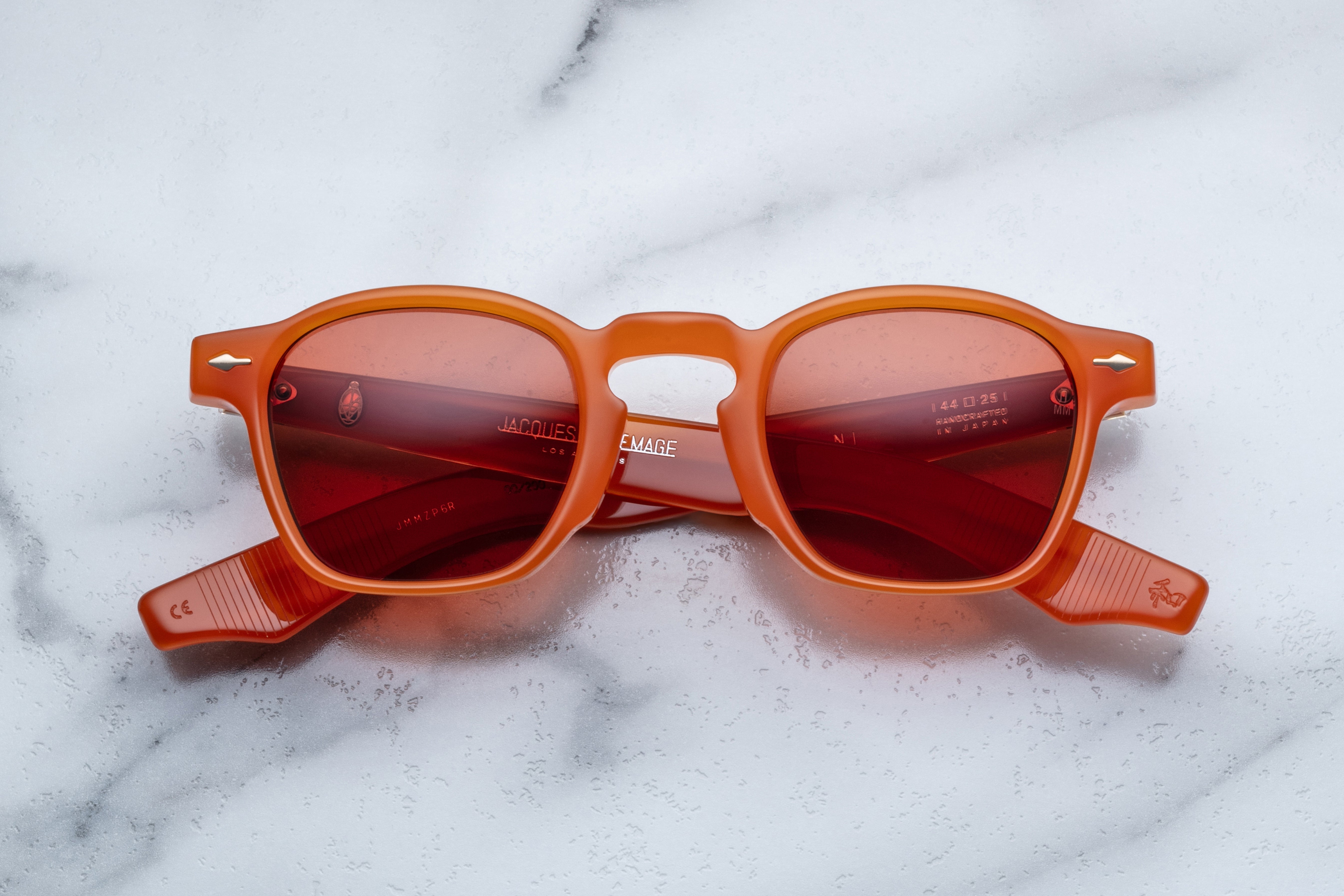 Jacques Marie Mage Zephirin sunglasses with stingray textured frames and clear lenses, front view showing stylish design.