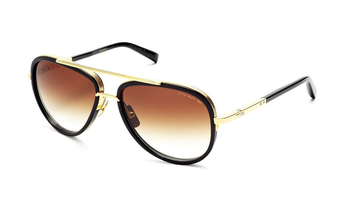 Dita MACH TWO sunglasses with round black frames and tinted lenses, shown from an angled side view.