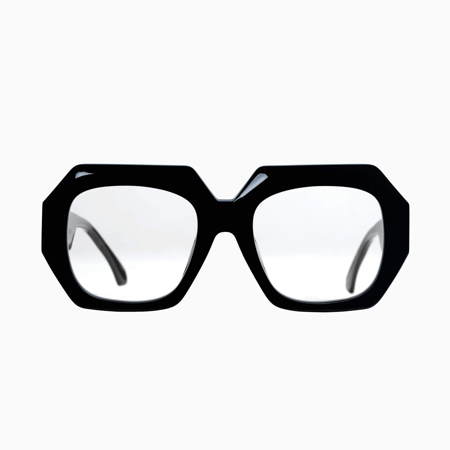 Valley Eyewear Monolith sunglasses with glossy black frames and clear lenses, showcasing modern, bold eyewear design