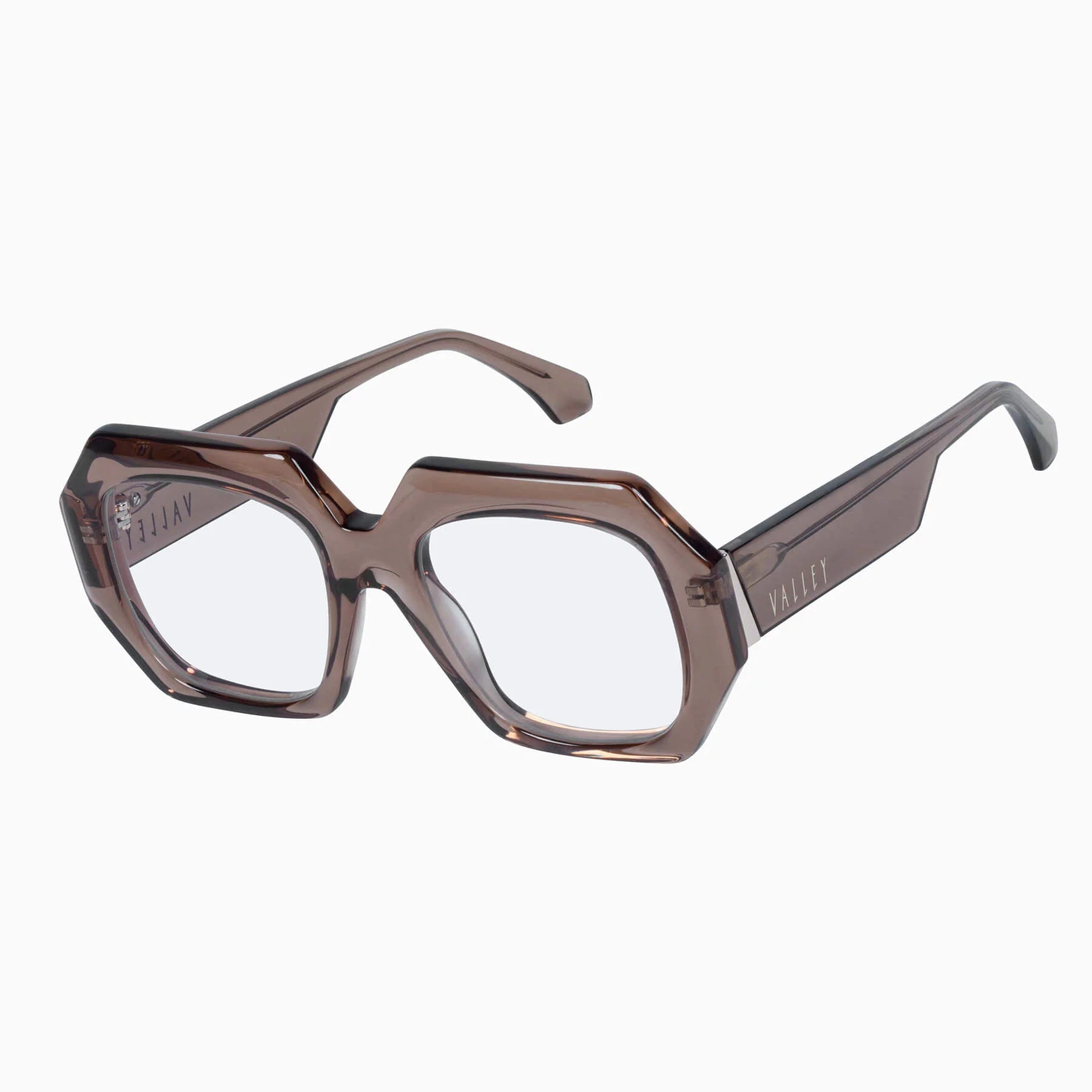 Valley Eyewear Monolith sunglasses with translucent mocha frames and clear lenses, close-up view of stylish eyewear design.