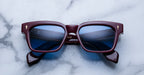 Jacques Marie Mage Molino Reserve sunglasses with black frames and dark tinted lenses, front view.