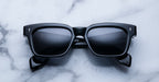 Jacques Marie Mage Molino Vanta sunglasses with sleek black frames and tinted lenses, front view showing modern design.
